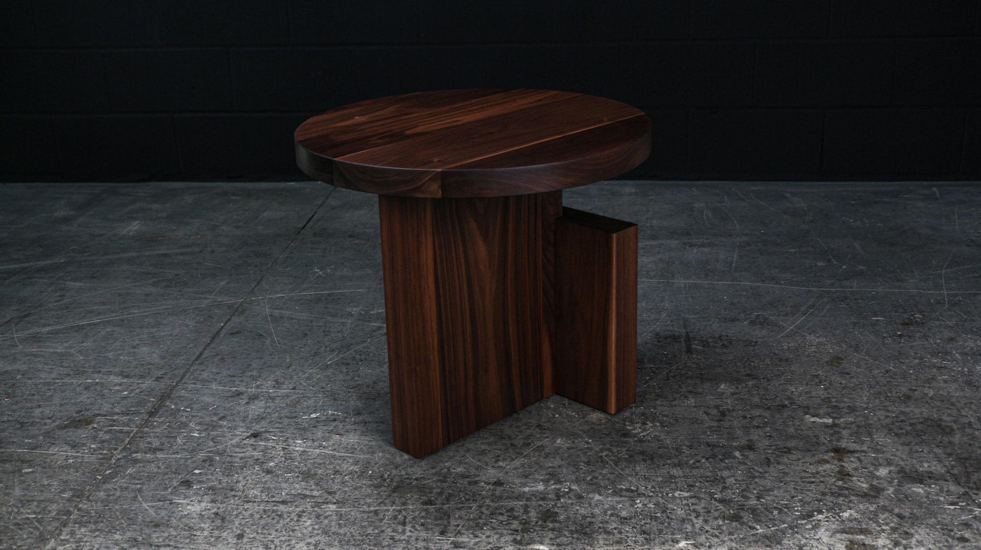 The Totem Side table is handmade from a thick solid wood surface. Offered in a Large & Small version , which can be paired as set of nesting table. The solid wood surfaces has an hand rubbed hardwax oil finish that enhance the real beauty of the