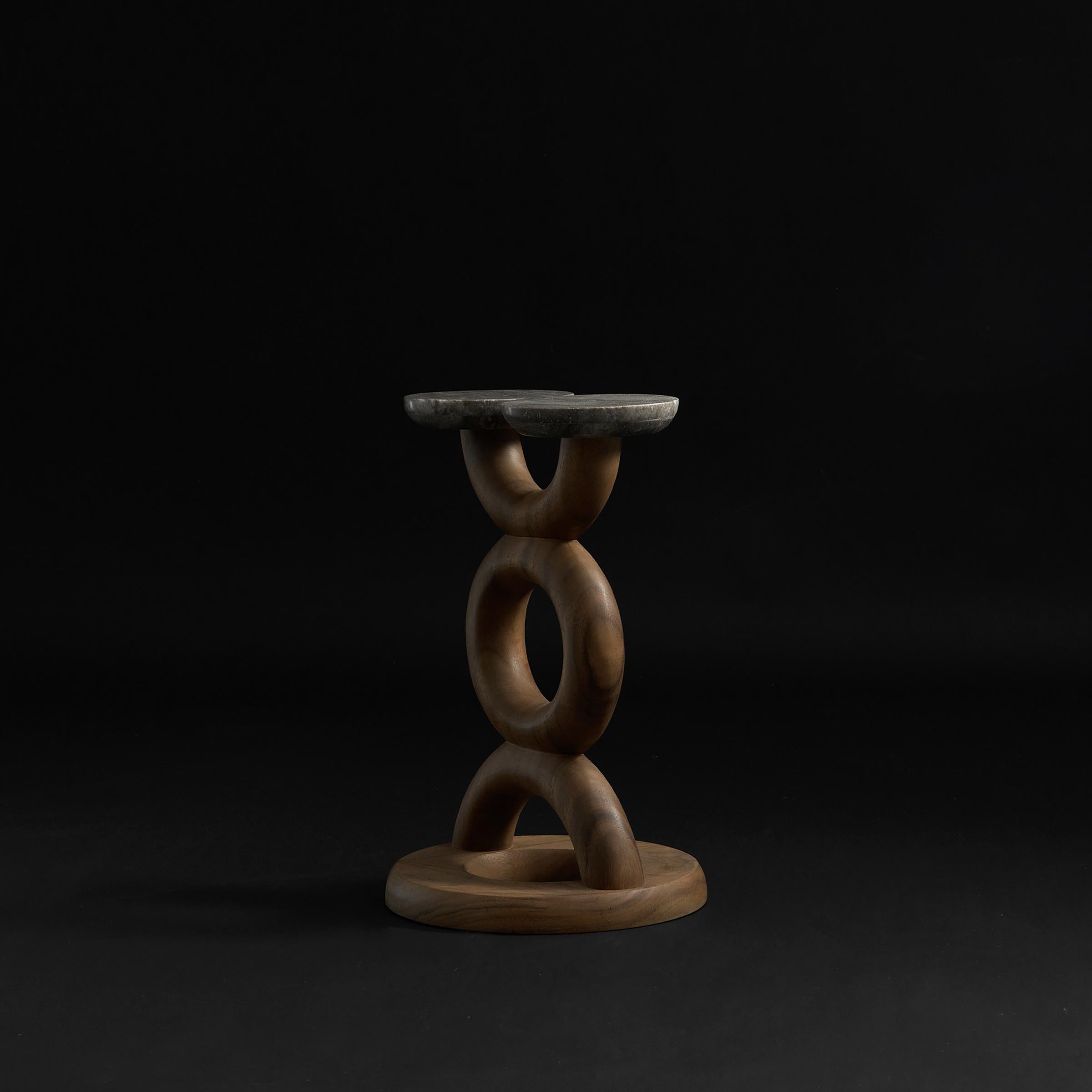 Totem Side Table by DAaZ
Dimensions: D 32.5 x W 35.5 x H 50.5 cm.
Materials: Albizzia wood, marble.


DAaZ Furniture honors the spirit of adventure. We embrace the escape of the ordinary and revel in the magic that’s found in the unexpected. Our