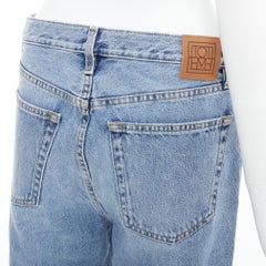TOTEME Classic Cut mid blue washed wide leg frayed hem jeans 28"