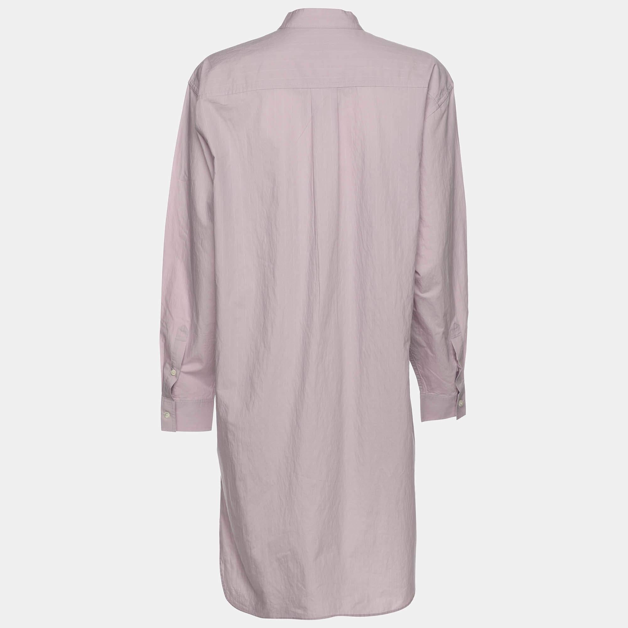 This designer dress is a chic and stylish garment that exudes elegance and sophistication. With its sleek design  flattering silhouette  and high quality craftsmanship  this dress is perfect for any special occasion or evening event  ensuring you