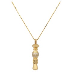 Totem Pendant in 18 Karat Yellow Gold with Diamonds and A Sapphire