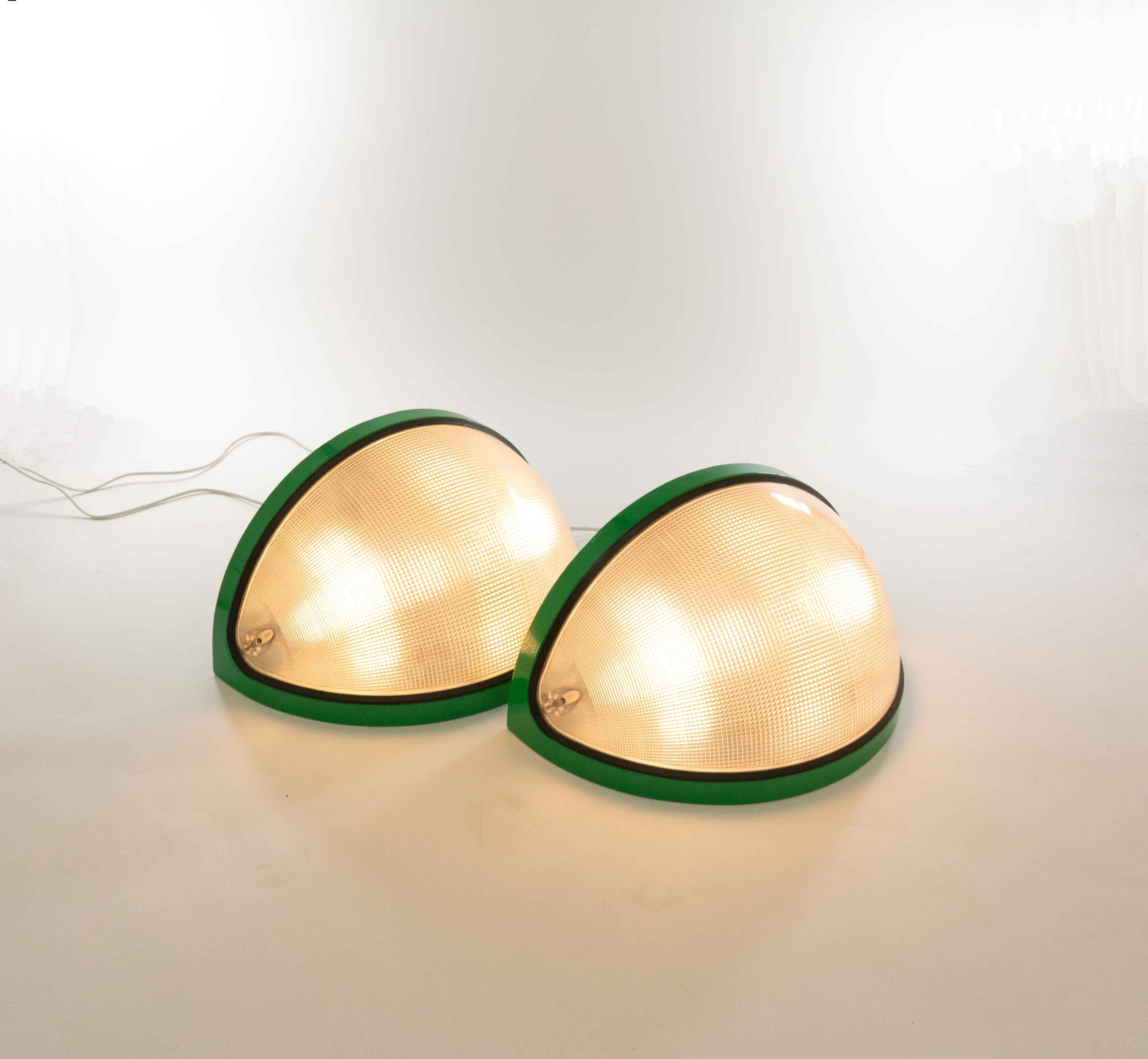 A pair of large Totum floor lamps designed by Gian Nicola Gigante, Marilena Boccato and Antonio Zambusi for Zerbetto Padova in 1975.

The pair consists of two equal quarters of a sphere made of prismatic methacrylate and lacquered aluminum. There
