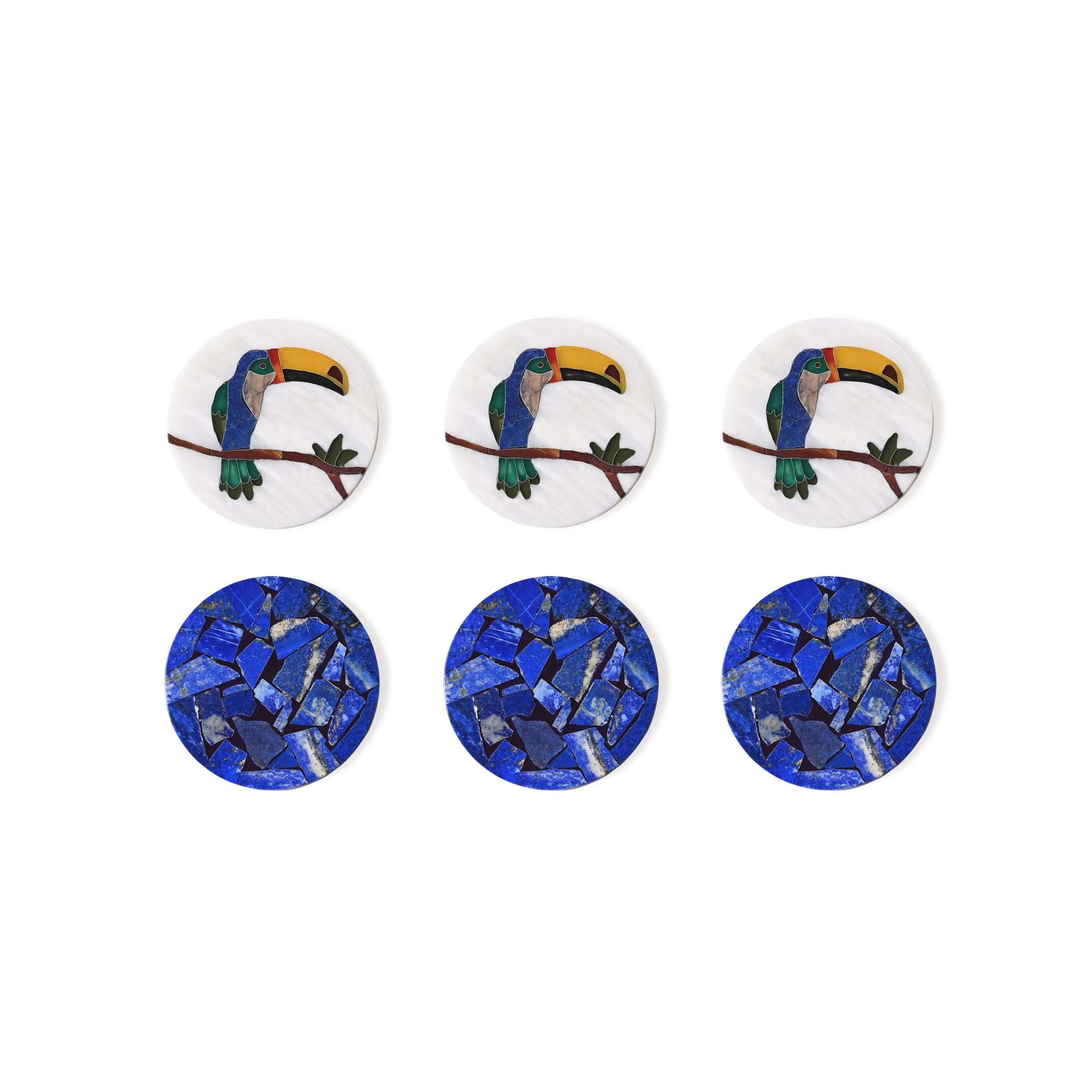 Toucan coasters by Studio Lel
Dimensions: D10 x H10 x H0.6 cm
Materials: Lapis Lazuli, Jade, Jasper, Marble

These are handmade from semiprecious stone and marble in a small artisanal workshop. Please note that variations and slight