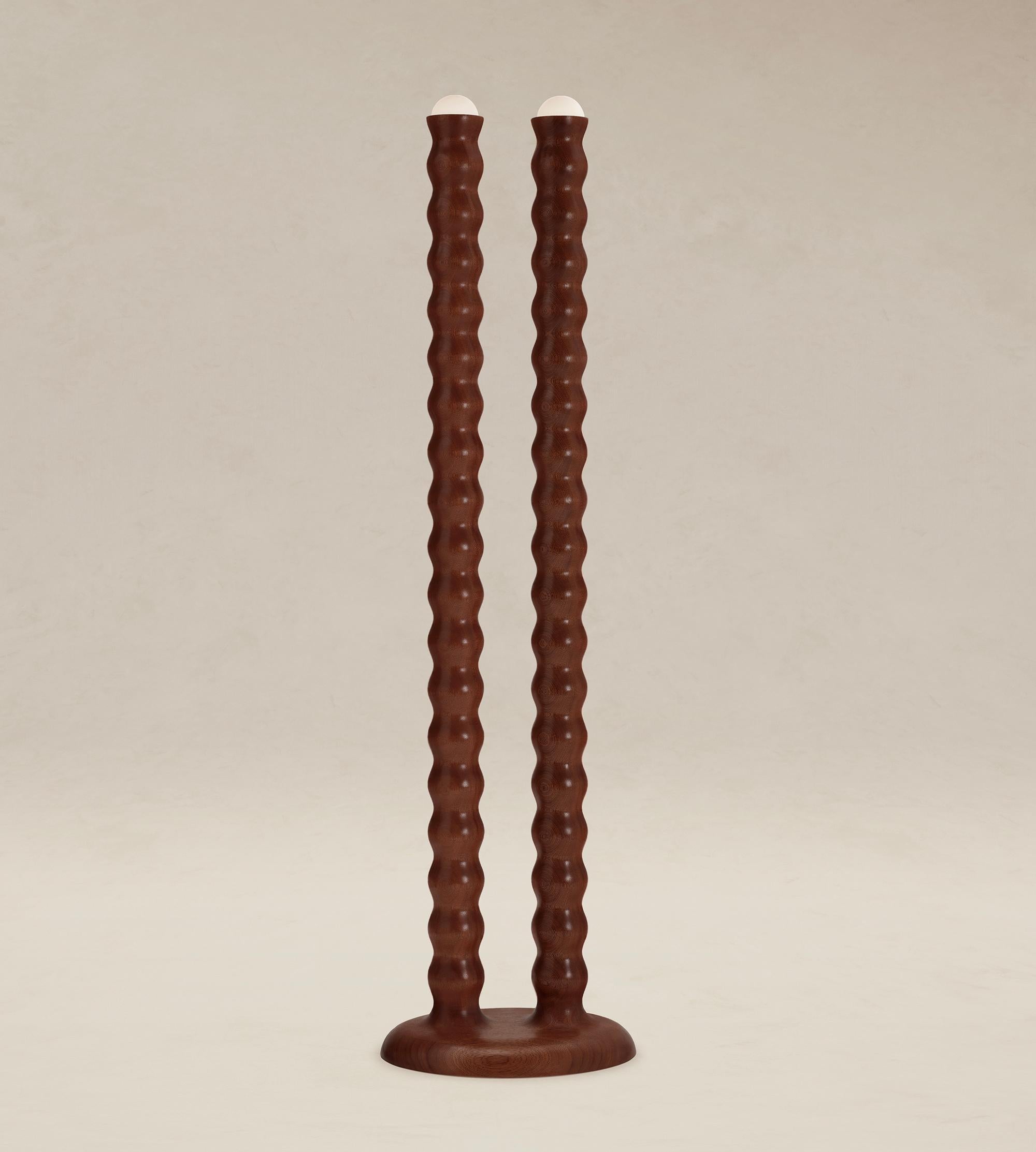 Lampada da terra Tougarine di Studio Aède
Dimensioni: D. 28 x L. 43 x H. 163 cm. 
Materiali: Mogano figurato. 

Luce dimmerabile con lampadina alogena. Disponibile in mogano figurato o in Oak. I materiali personalizzati sono disponibili su