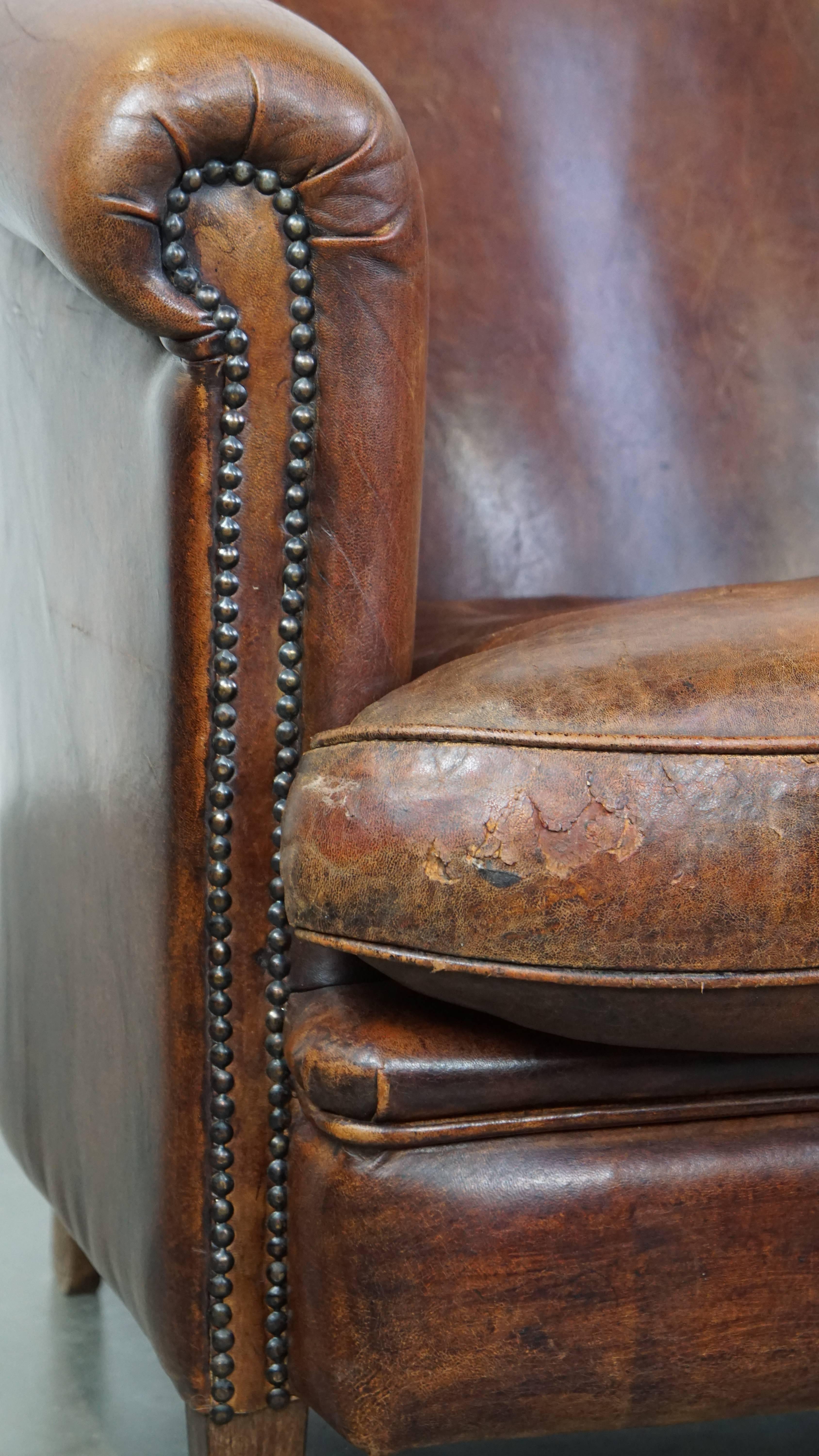 Tough, characterful, and comfortable cognac-colored sheepskin club armchair For Sale 6