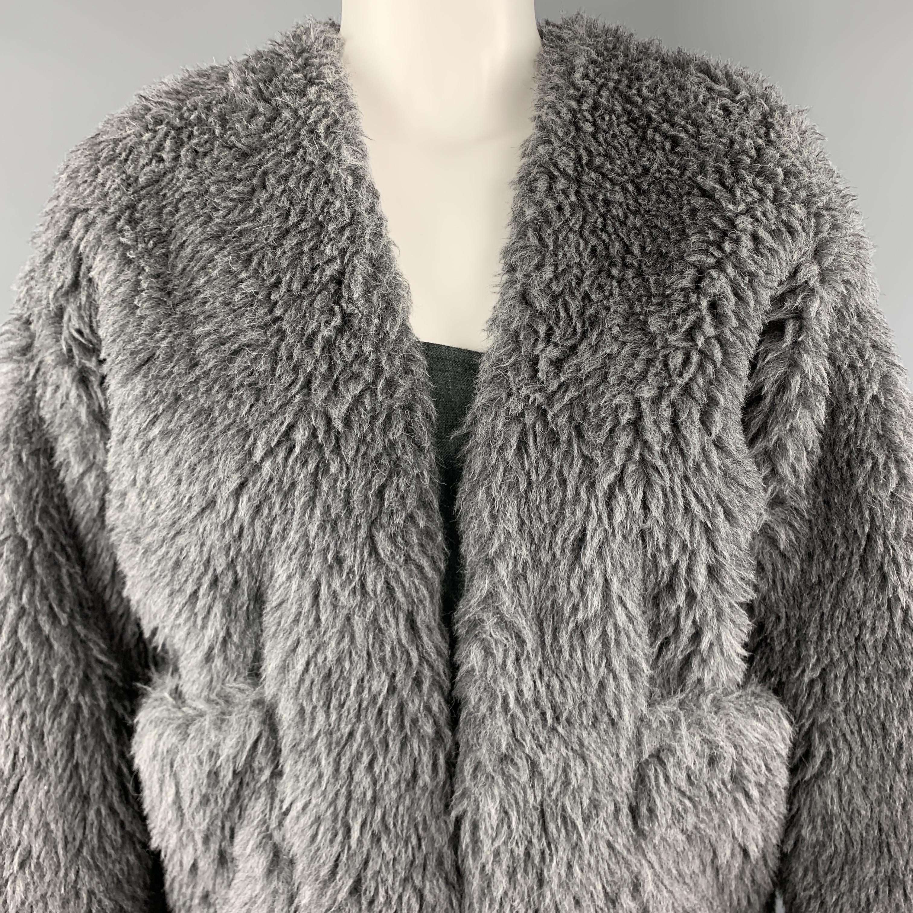 TOUJOURS jacket comes in gray alpaca blend faux fur with a V neck, hidden button closure, patch pockets, and silk blend liner. Made in Japan.

New with Tags.
Marked: S

Measurements:

Shoulder: 22 in.
Bust: 48 in.
Sleeve: 19 in.
Length: 25 in.