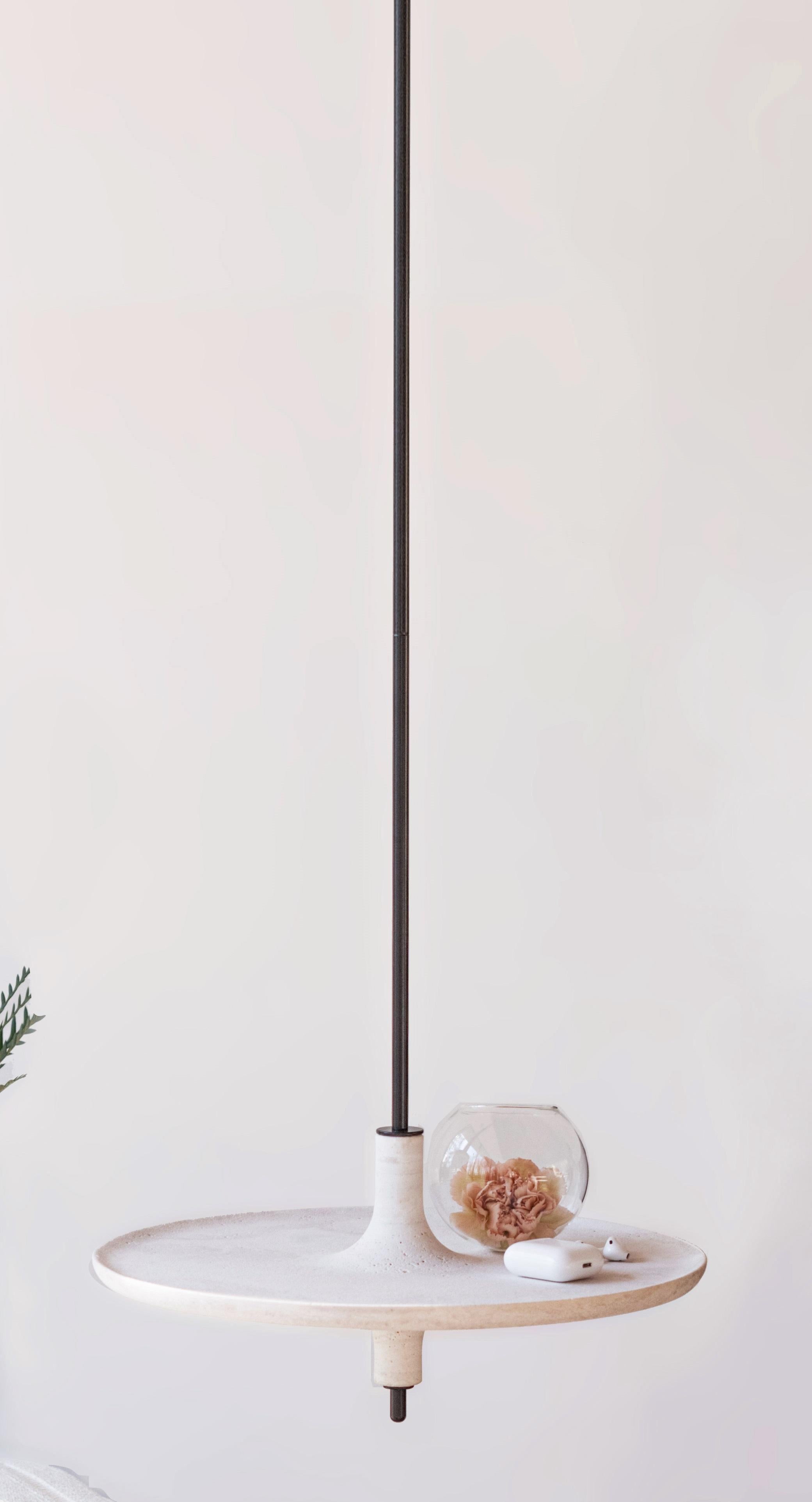 Toupy Travertine and Black Metal 38 Hanging Table by Mademoiselle Jo
Dimensions: Ø 38 x H 150 cm.
Materials: Travertine and black metal.

Available in four wood colors, three marble options, two bar versions and several diameters. Please contact us.