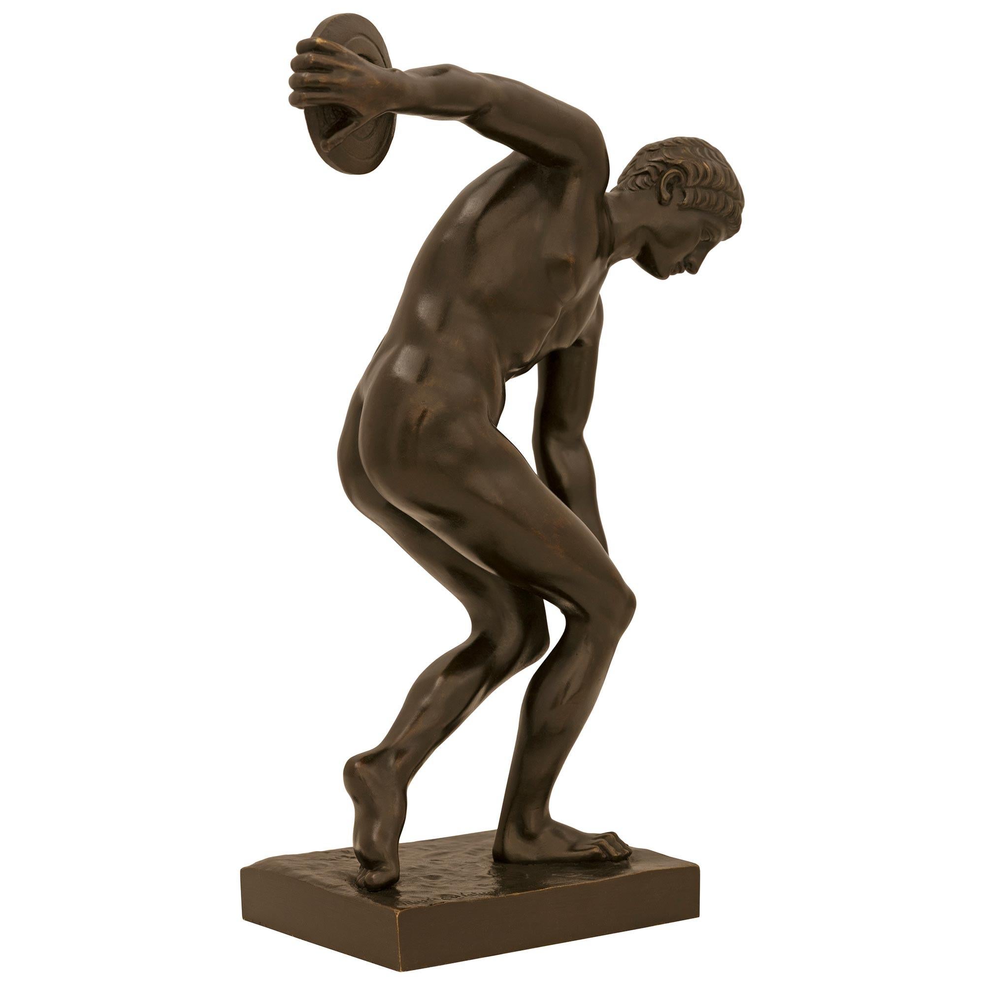 Grand Tour Tour Period patinated Bronze statue of The Discus Thrower, modeled after Myron For Sale