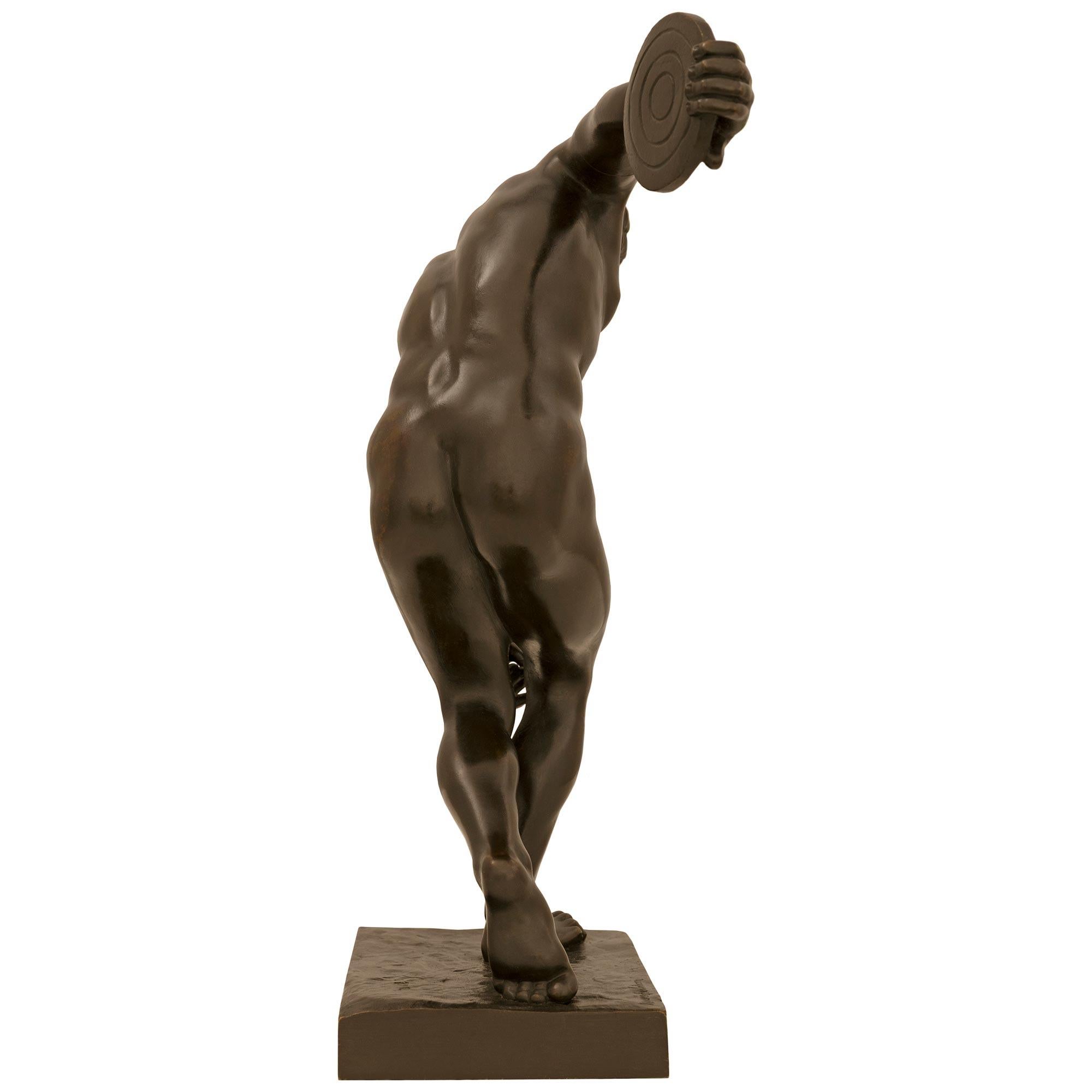 Italian Tour Period patinated Bronze statue of The Discus Thrower, modeled after Myron For Sale