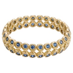 Bracelet « Tourbillon Blue Sapphire » en or jaune 18 carats, par MARIANNE CANARELLI
