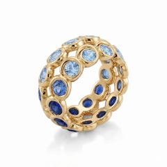 Tourbillon Blue Sapphires Ring in 18k Yellow Gold by MARIANNE CANARELLI