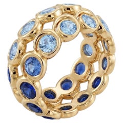 Tourbillon Blue Sapphires Ring in 18k Yellow Gold by MARIANNE CANARELLI