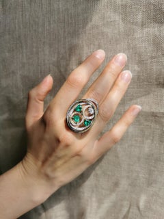 Tourbillon Ring in 18K White Gold Set With Emeralds and Diamonds
