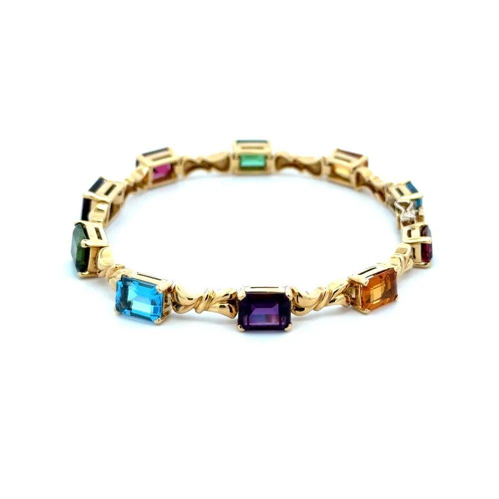 Tout simplement magnifique ! Bracelet à maillons en or et à pierres multiples, finement détaillé. Serti à la main de tourmaline, d'améthyste, de topaze et de citrine, pesant environ 15 tonnes. Le bracelet mesure environ 7