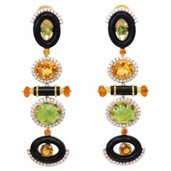 Boucles d'oreilles pendantes en or jaune 18k tourmaline et onyx noir diamants