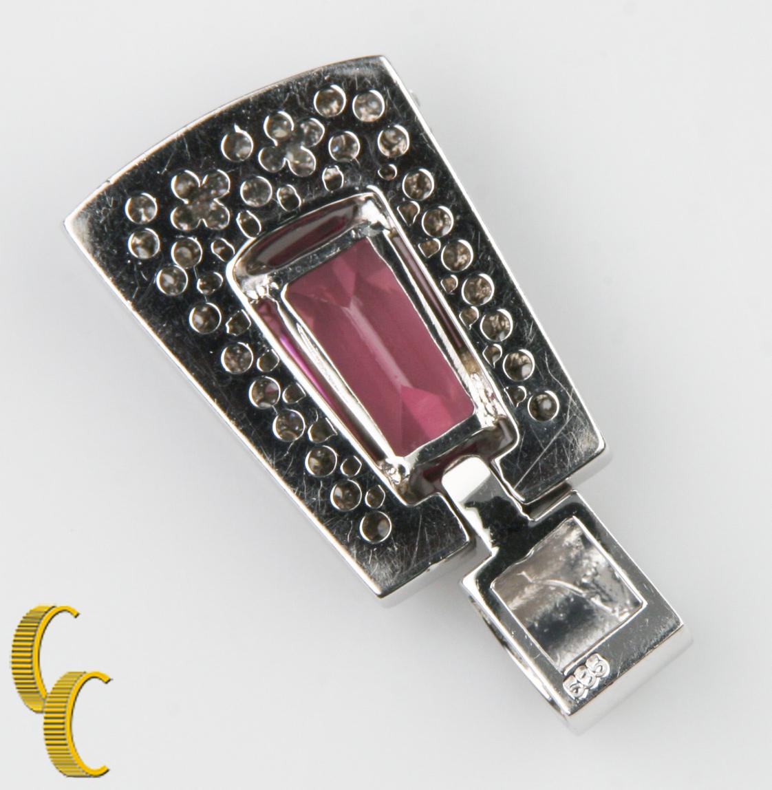 One electronically tested 14k white gold ladies cast & assembled tourmaline and diamond pendant with a bright polish finish.

the pendant features a pink tourmaline set within a pave' set diamond bezel, completed by a white gold bail
identified with