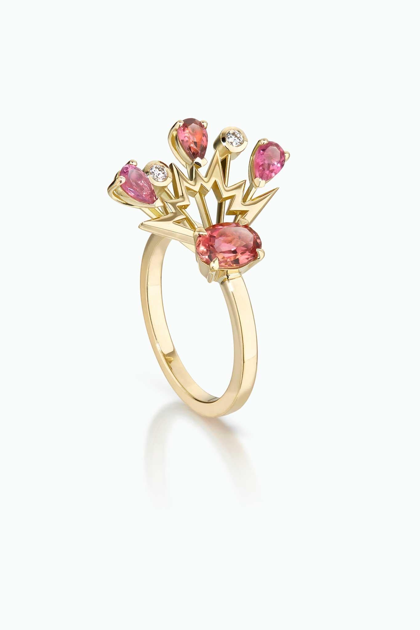Handcrafted  in London in 18 Carat Yellow Gold with a Central Oval Cherry Coloured Tourmaline, surrounded by Brilliant Cut Diamonds, and Pear Shaped Pink Sapphires and Tourmaline.

Cherry Bomb Ring is a unique, modern and layered design, that
