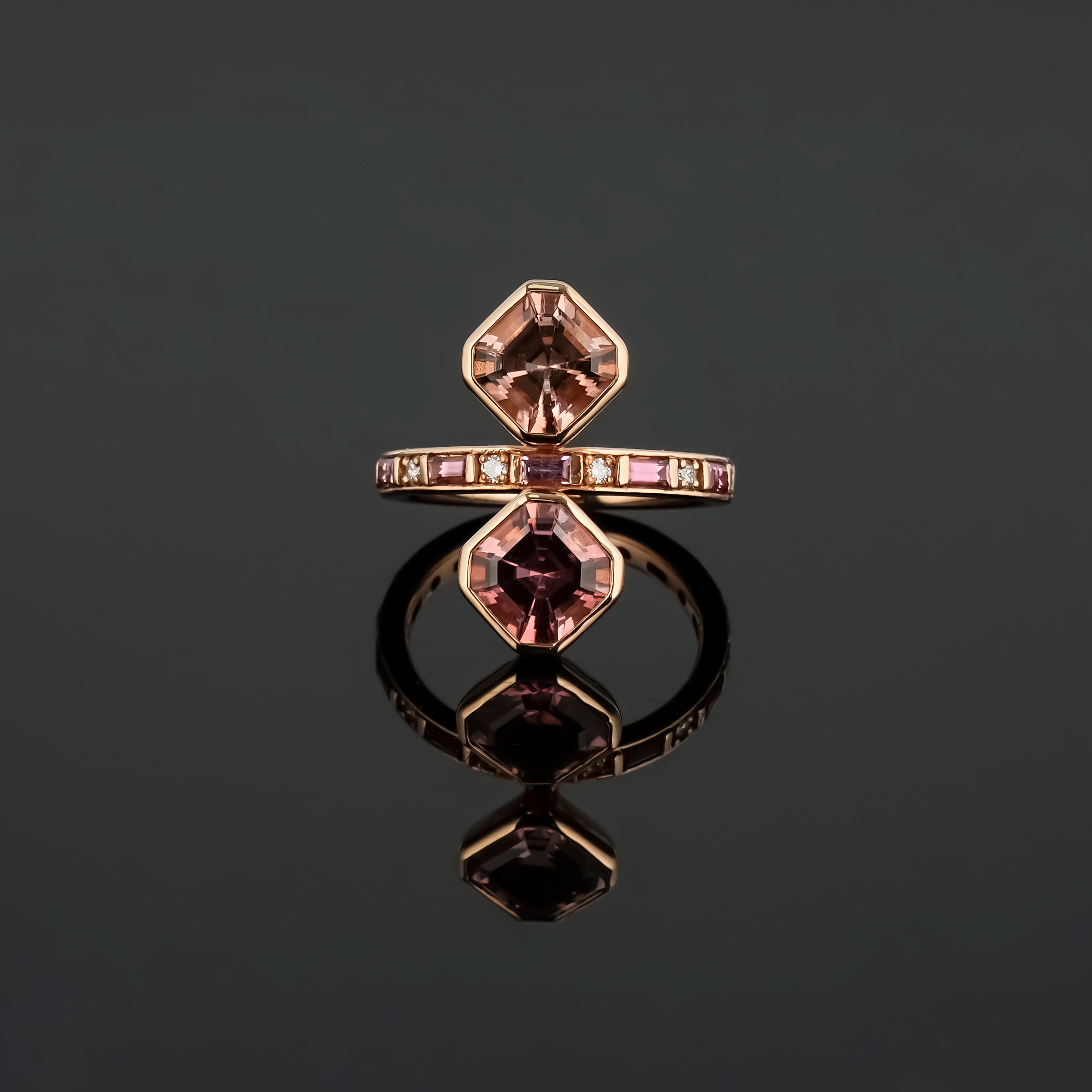 A beautiful, 3.03 carat asscher shaped peach Tourmaline cocktail ring, set in solid 18K rose gold. The Tourmalines are transparent, with a beautiful peach-pink color and amazing luster. Whether worn for a special occasion or as an everyday statement