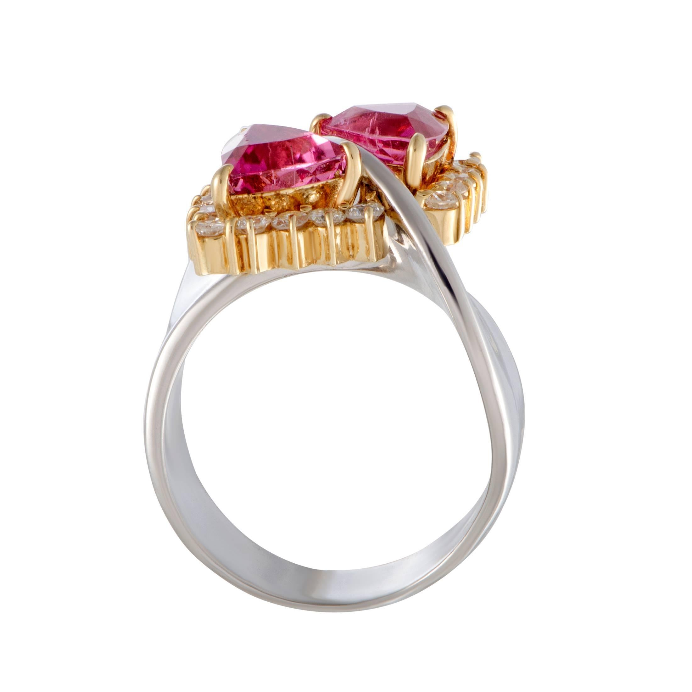 This flawless ring is extravagantly designed in a beautiful combination of classy platinum and shimmering 18K yellow gold. The alluring ring is adorned in 0.57ct of dazzling diamonds and two mesmerizing pink tourmalines, weighing 2.18ct.
Ring Top