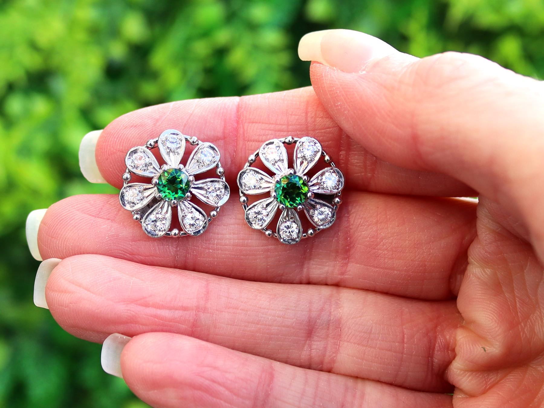 A fine and impressive pair of vintage 0.80 carat tourmaline and 0.80 carat diamond, 14 karat white gold earrings; part of our vintage jewelry collections.

These impressive vintage tourmaline and diamond earrings have been crafted in 14k white