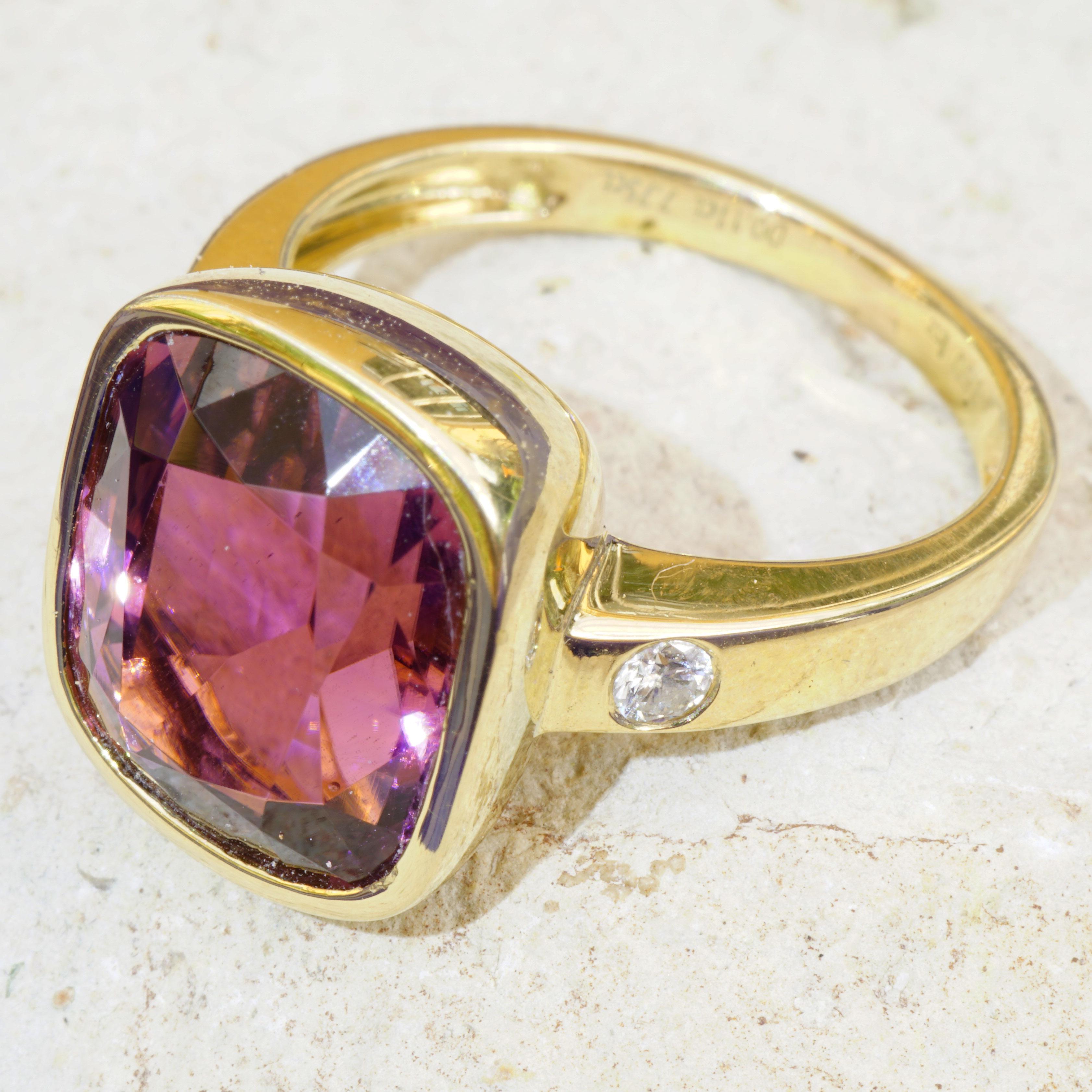 a terrific intense pink tone with a hint of apricot hallmarked with the Schmuckzicke logo, this ring will be a special friend, a tourmaline in the exceptional color deep pink with a gemologist's certificate, from the Kunar mine in Afghanistan,
