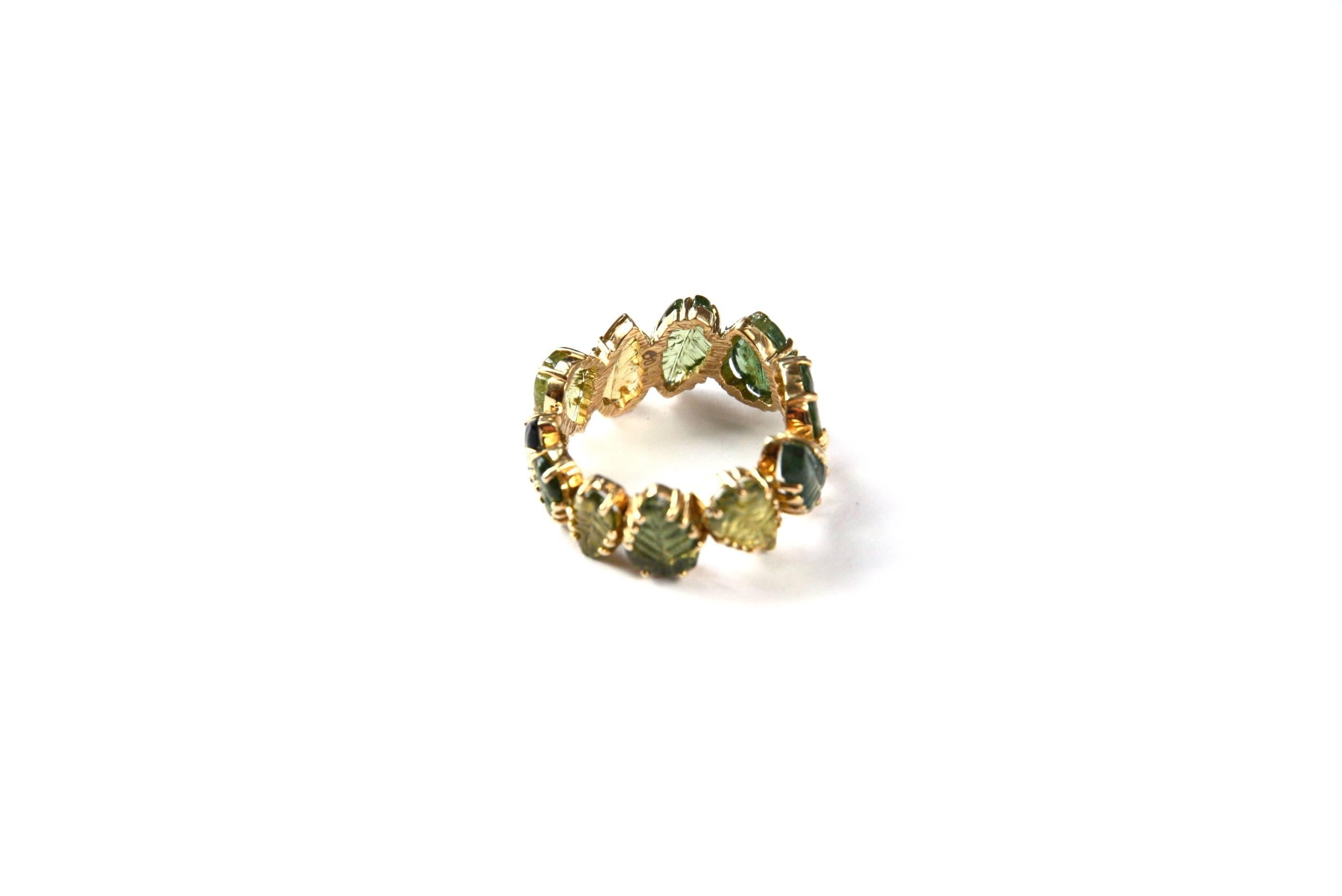 Very special band ring size 13 eu with different shape and color green  tourmaline cts 2,80, linked with yellow  18 kt gold gr. 5,00.
All Giulia Colussi jewelry is new and has never been previously owned or worn. Each item will arrive at your door