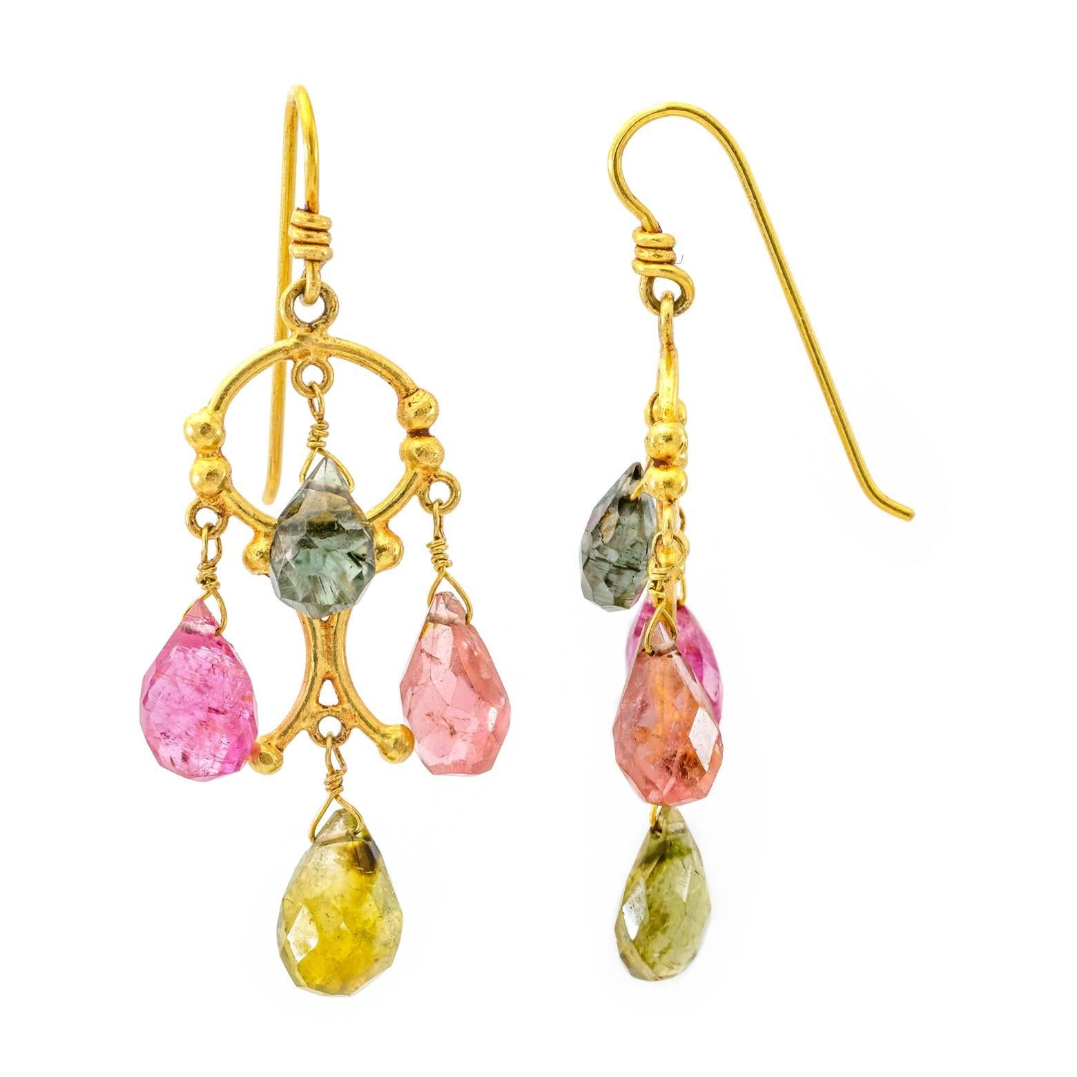 Summery warm pink and green tones dangle from intricately designed 18K yellow gold. These tourmaline briolettes come in four different shades from light pink to dark forest green. They dangle and swing with the gentle tinkling sound of 