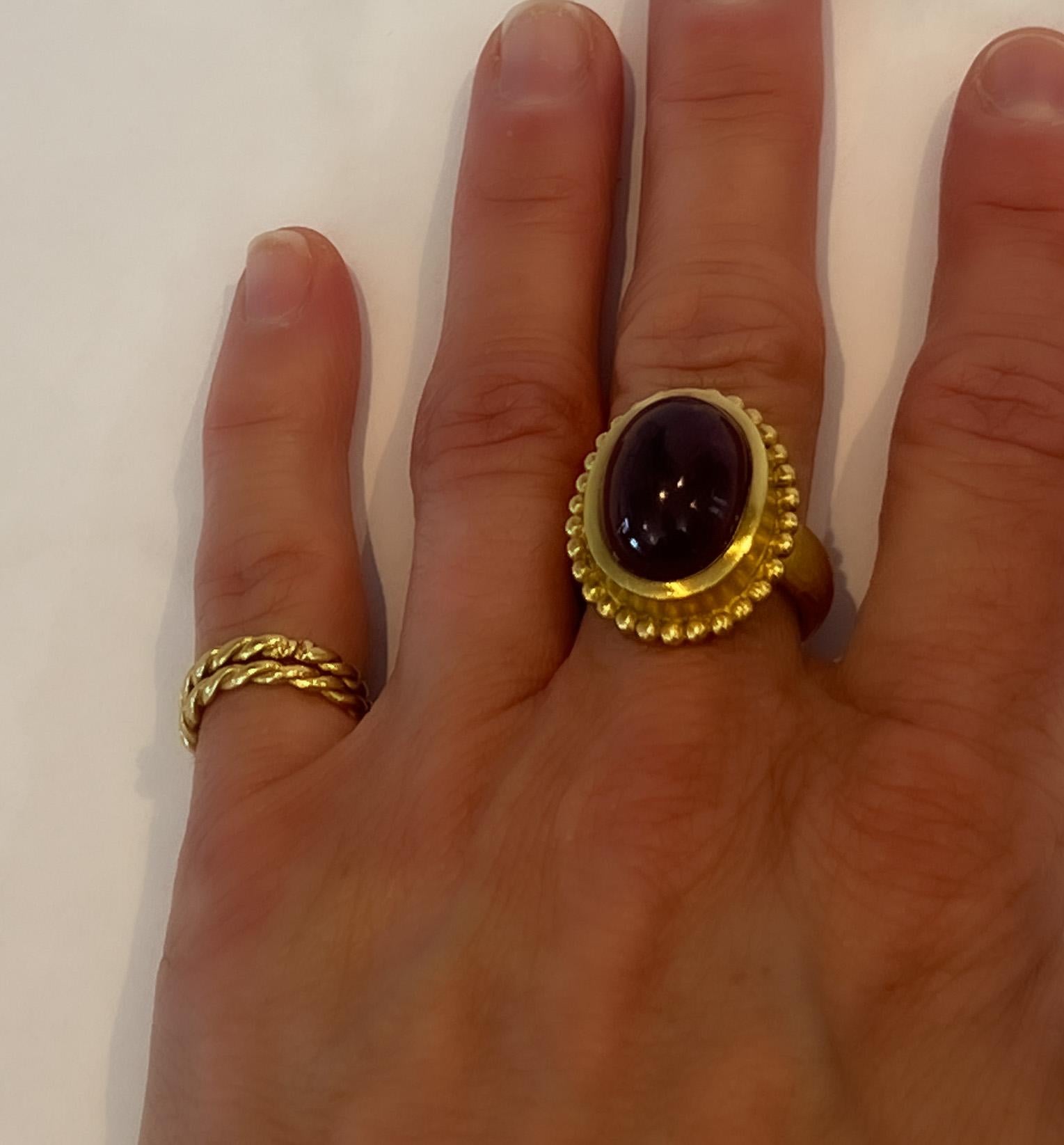 Stunning Red Tourmaline Cocktail Ring, is set in 22k gold using the ancient technique of granulation.  Bringing an old world feel with a modern twist. Hand made, one of a kind stunner. 

The Tagili Promise: With every Ring sold, a portion of the