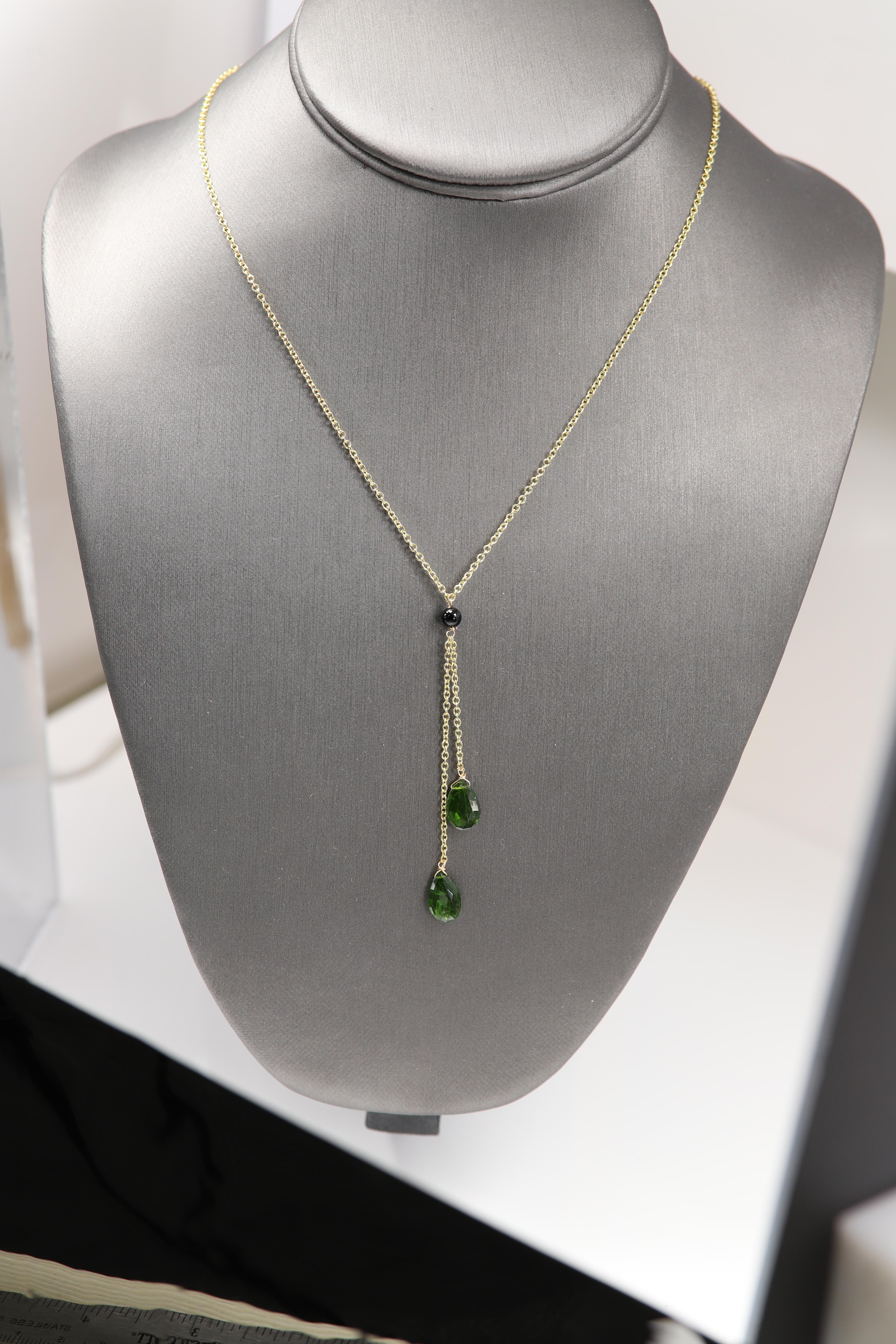 Elegant and Classic Beaded Dangling Green Tourmaline Necklace

14k Yellow Gold – Cable chain with wire work (all parts are 14k gold)
Chain Length 17’ Inch
Stone type: Natural Tourmaline with minor facets pear shape cut
Stone Color: Green
Stones