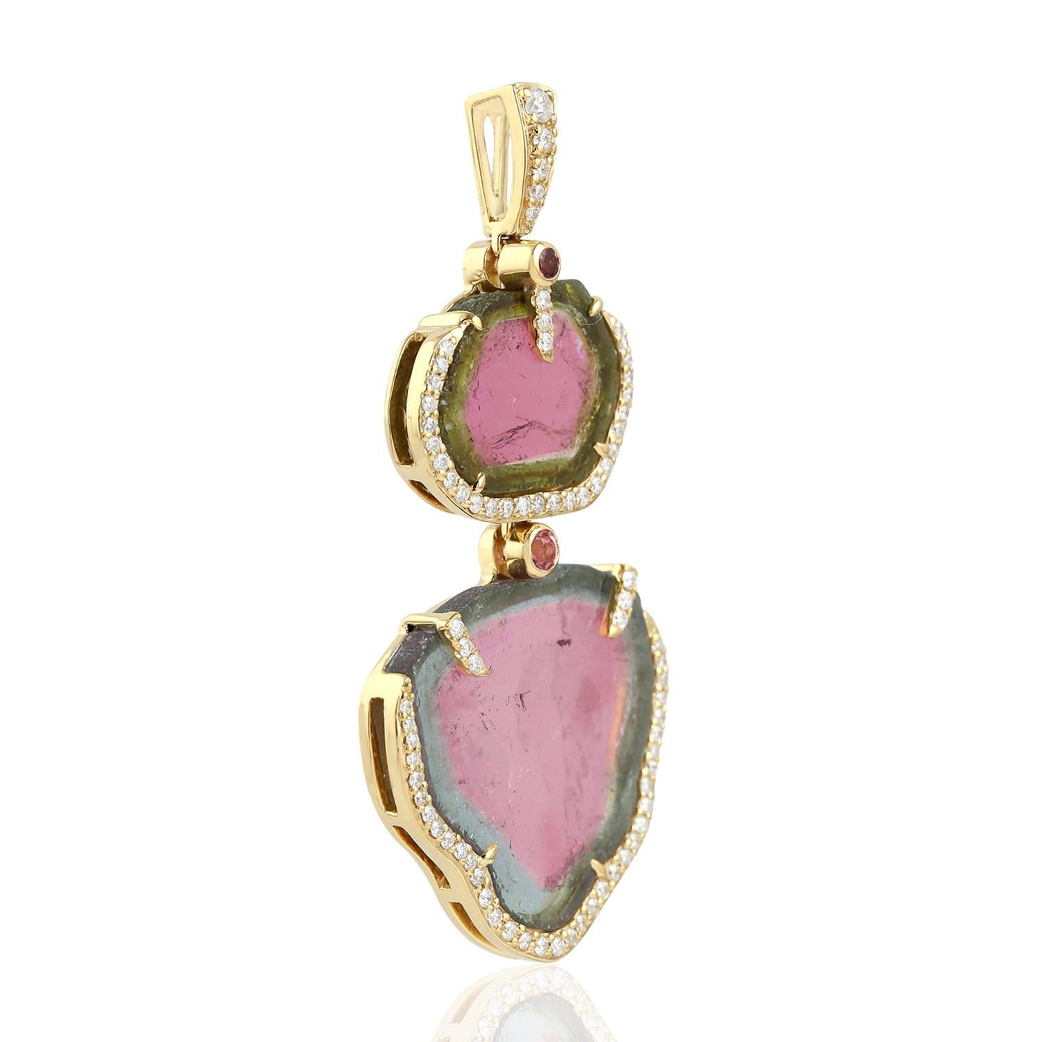 This stunning pendant has been meticulously crafted from 18-karat gold. It is set with 25.09 carats of watermelon tourmaline & .69 carats of sparkling diamonds.

FOLLOW  MEGHNA JEWELS storefront to view the latest collection & exclusive pieces. 