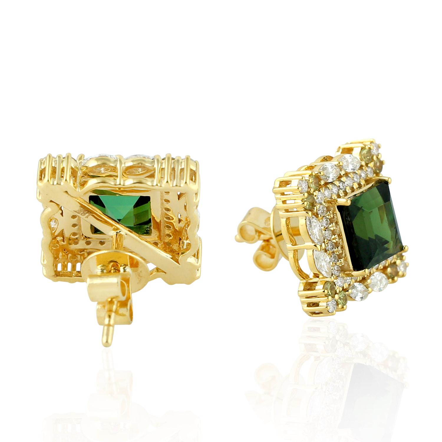Cast from 18K gold, these beautiful stud earrings are hand set in 3.3 carats tourmaline, peridot and .80 carats of sparkling diamonds.

FOLLOW  MEGHNA JEWELS storefront to view the latest collection & exclusive pieces.  Meghna Jewels is proudly