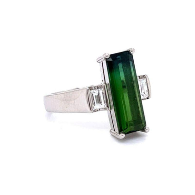 Tourmaline, Diamond And Platinum Vintage Ring

Everyone will be green with envy.  This estate ring is a classic beauty, emerald cut vibrant green tourmaline and diamond baguettes set in platinum.  

Additional information:
Metal Type : Platinum