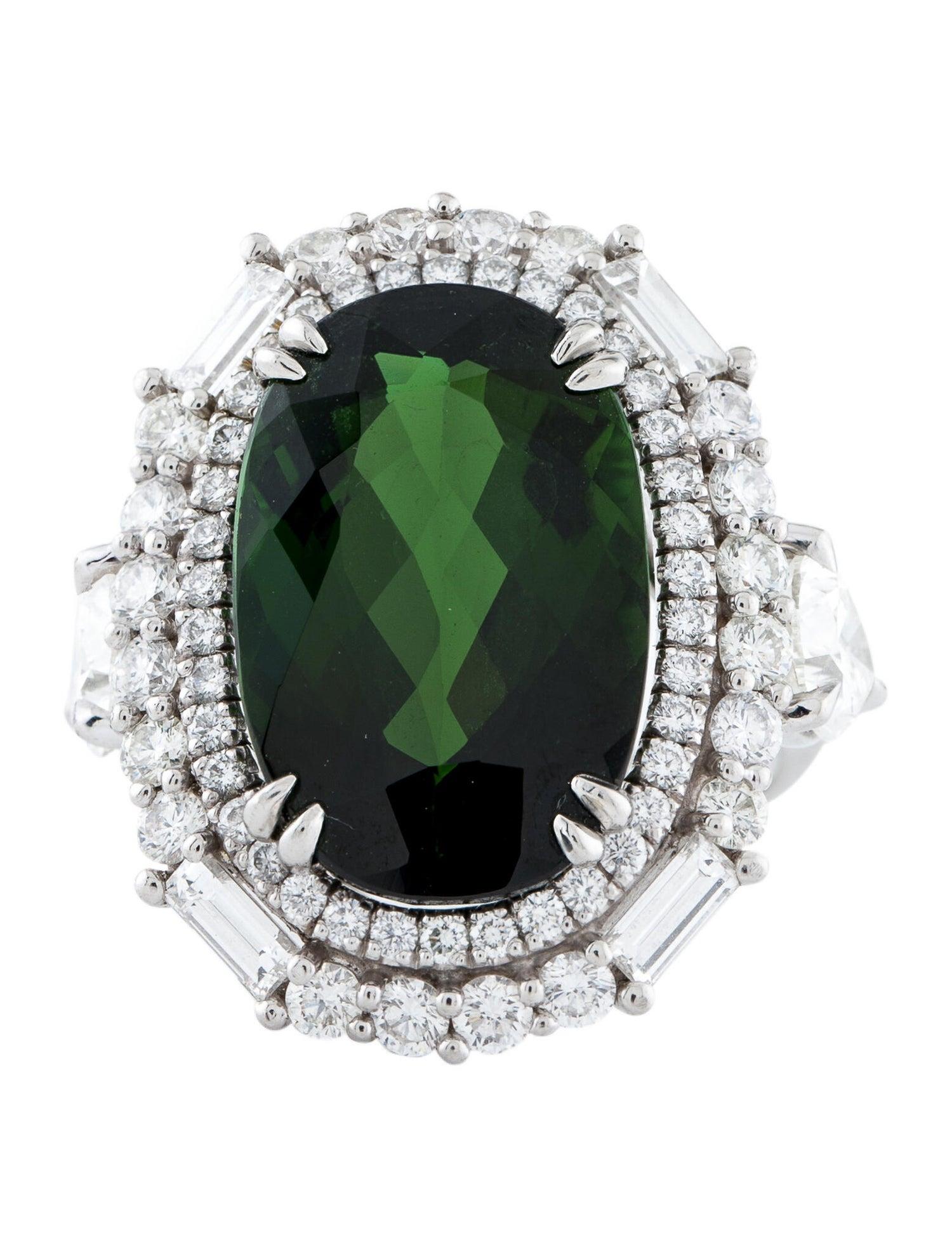 8.83 Carat Oval Modified Brilliant Tourmaline with 0.93 Carat Pear Brilliant Diamond, 0.91 Carat Pear Brilliant Diamond, 0.32 Carats of Baguette Diamonds, 1.10 Carats of Round Brilliant Diamonds & 0.43 Carats of Round Brilliant Diamonds in Platinum