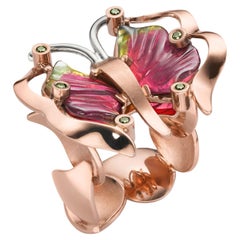 Anello con tormalina e diamante in oro rosso da 14 carati