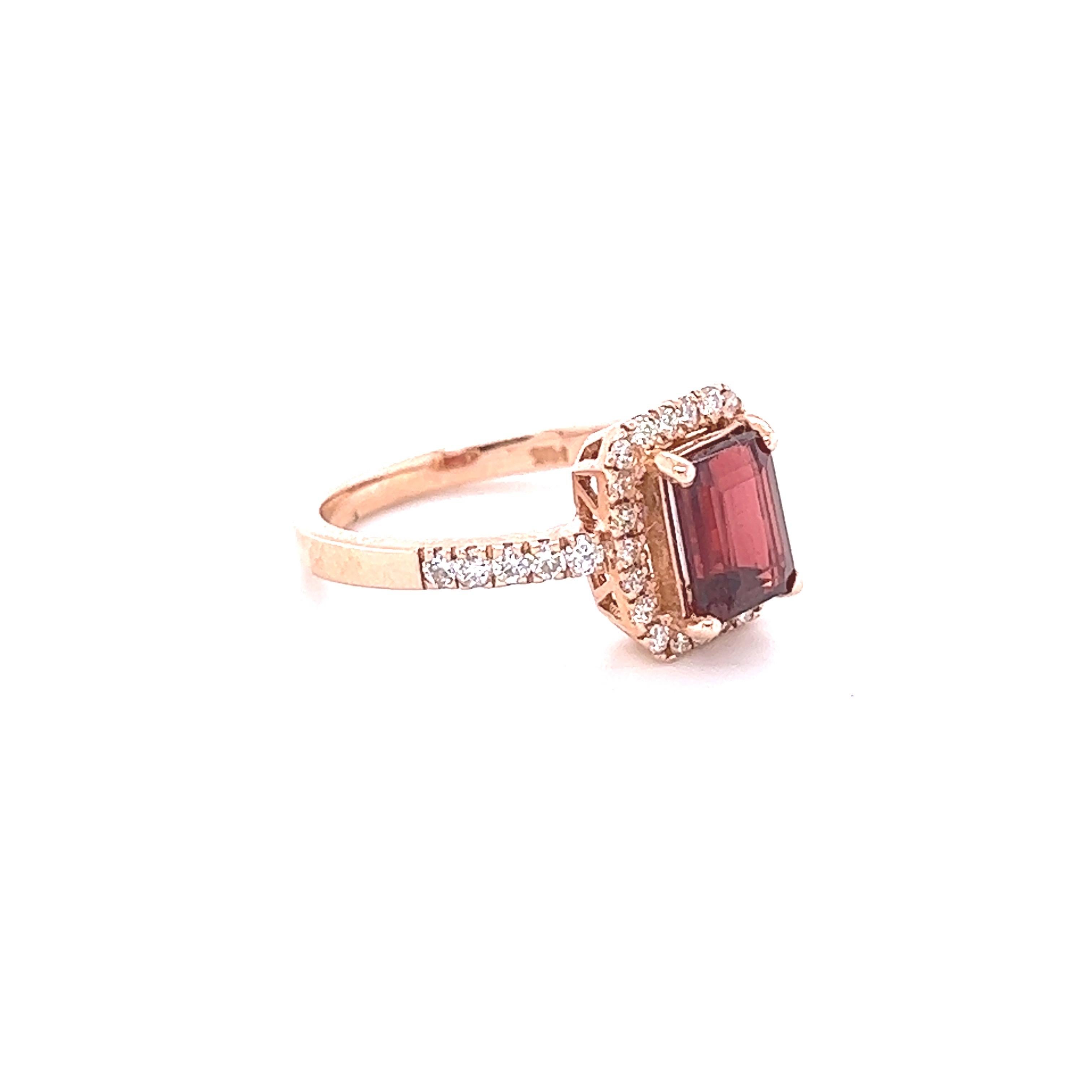 This ring has a Emerald Cut Red Tourmaline that weighs 2.02 Carats and has 32 Round Cut Diamonds that weigh 0.46 carats. The clarity and color of the diamonds are VS-H.
The total carat weight of the ring is 2.48 Carats. 
The Emerald Cut Tourmaline