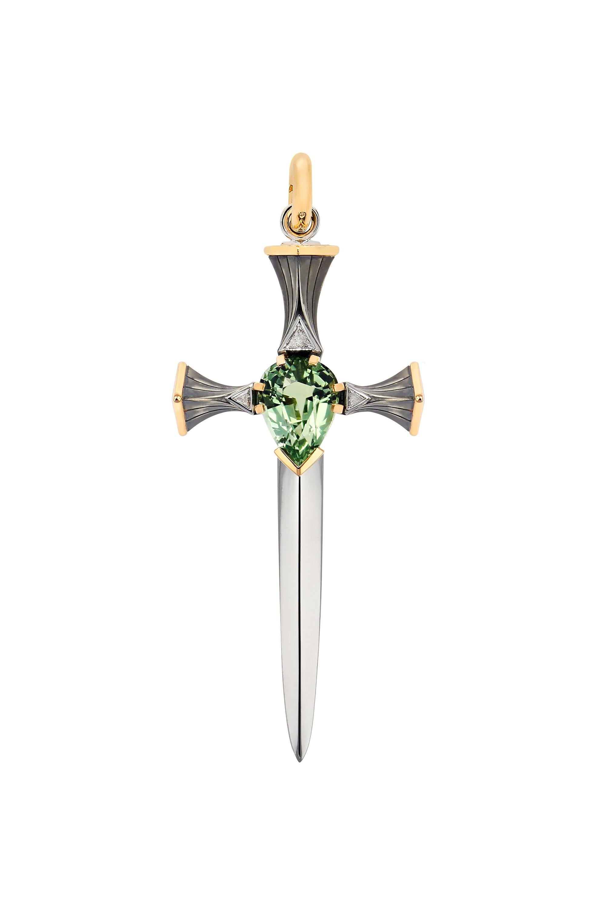 Épée with a gold and distressed silver handle, featuring in its center a pear-shaped tourmaline surrounded by triangular diamonds, extending into a mirror-polished platinum blade. Openable gold bail. 

Sold without chain.

Available with chain on