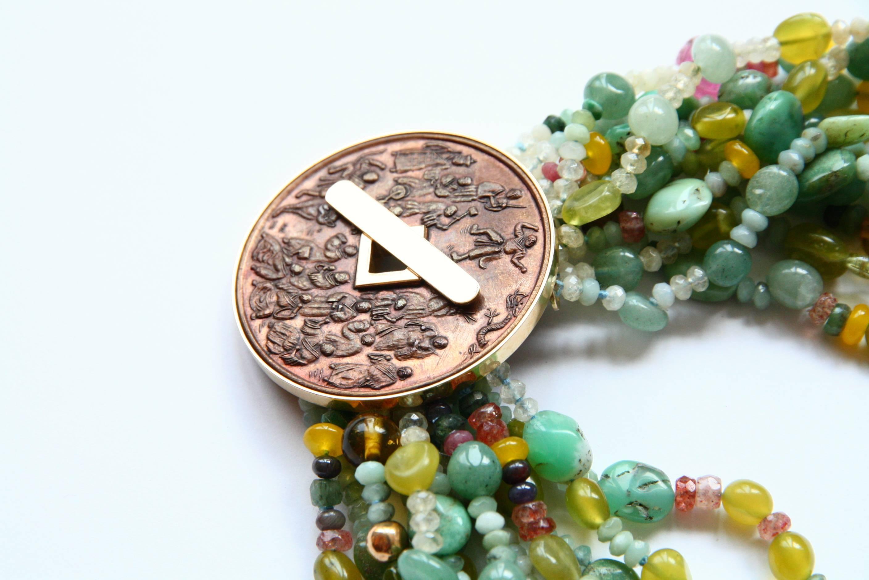Amazing torch multi stone necklace tourmaline, jade, amazzonite, agata.... with antiques cinese bronze  coin linked in 18kt gold gr 14,90. Total length is 47 cm.
All Giulia Colussi jewelry is new and has never been previously owned or worn. Each