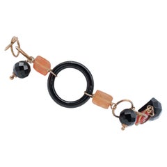 Bracciale con tormalina, onice e retrò