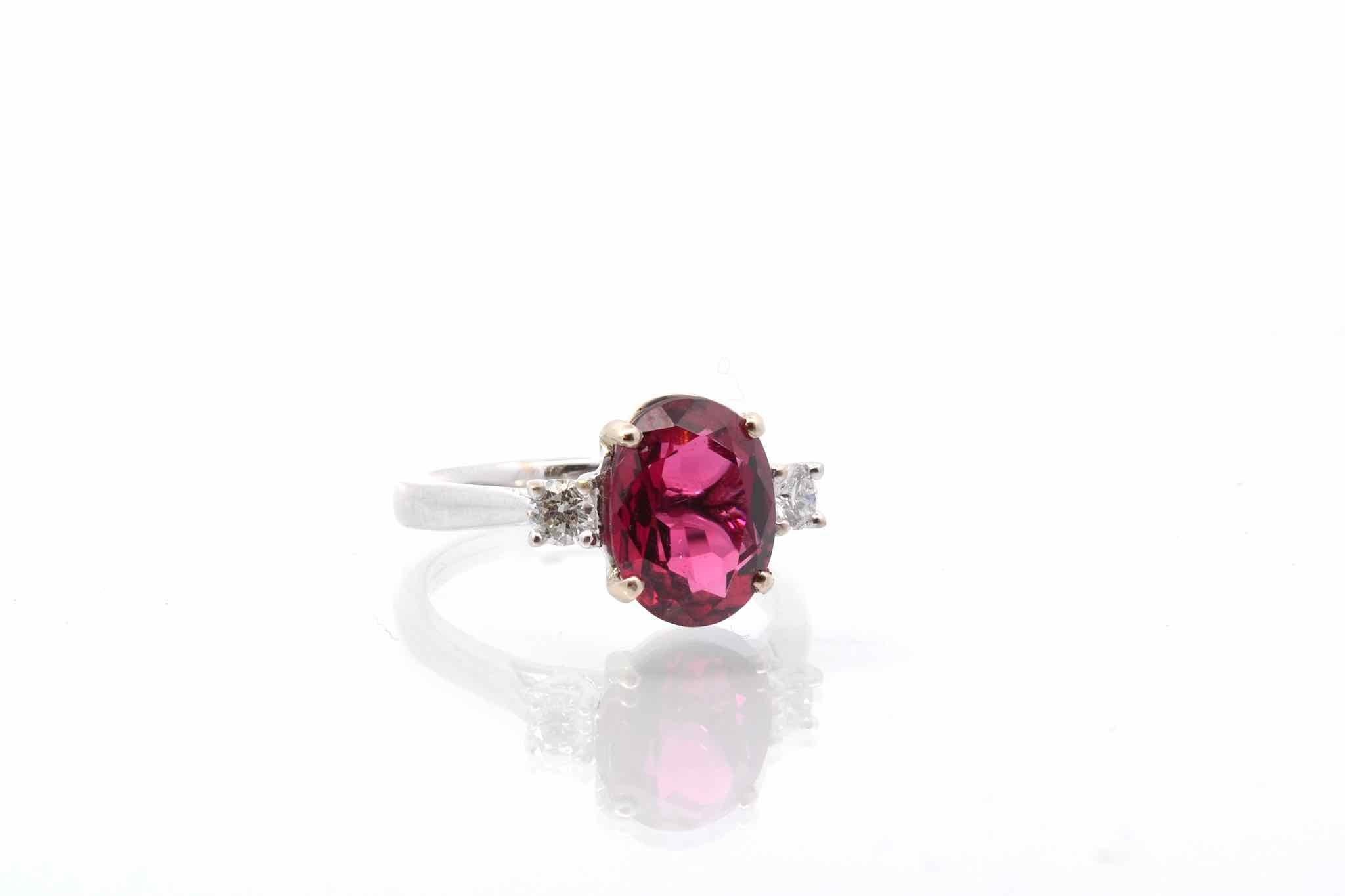 Oval Cut Tourmaline rubellite and diamonds ring in white gold