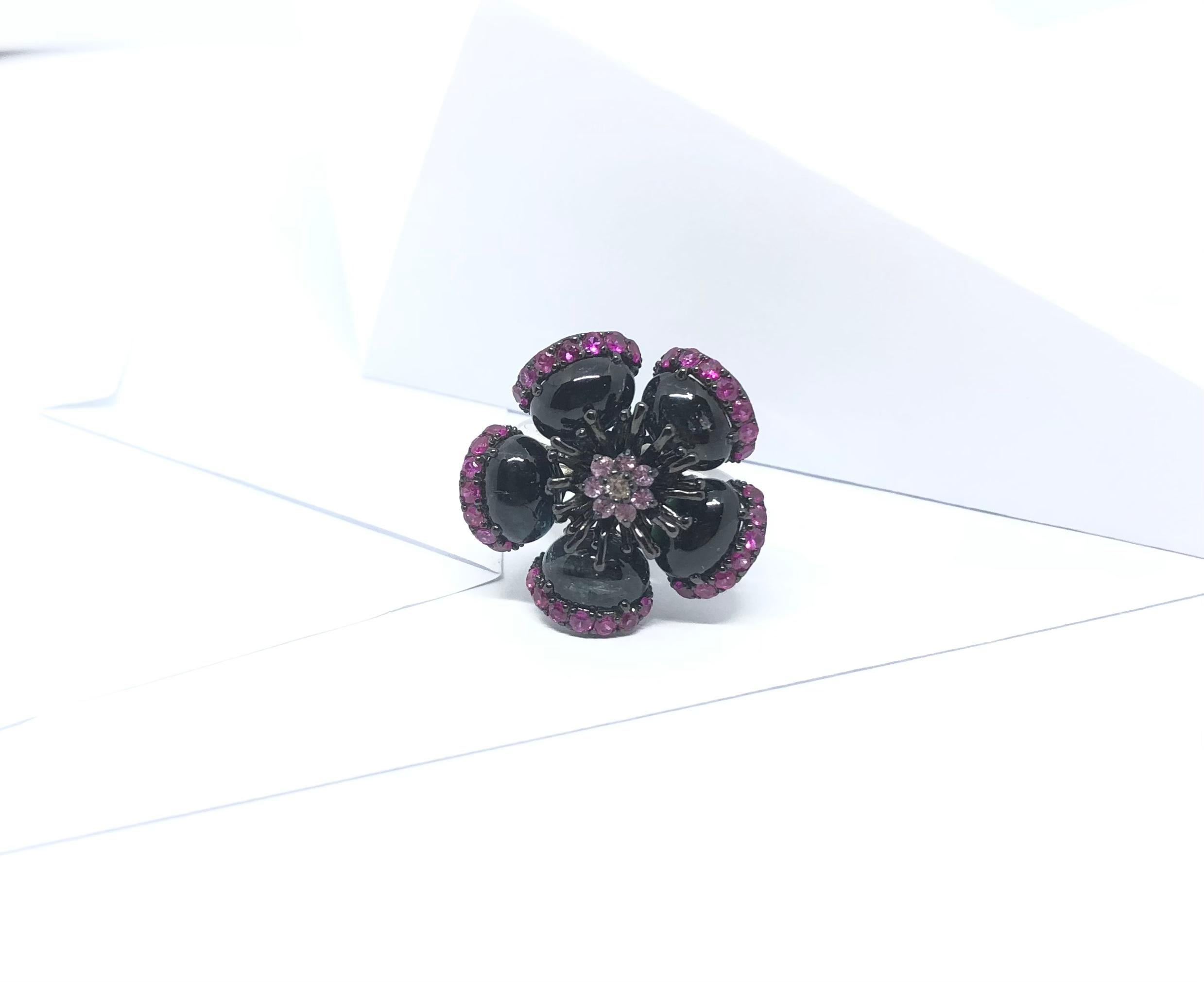 Tourmaline, Ruby and Pink Sapphire Ring set in Silver Settings

Width:  2.6 cm 
Length: 2.6 cm
Ring Size: 55
Total Weight: 11.06 grams

*Please note that the silver setting is plated with rhodium to promote shine and help prevent oxidation. 