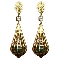 Cage-Ohrringe mit Turmalin und Saphir aus 18 Karat Gold