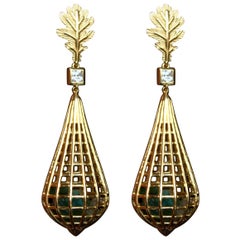 Boucles d'oreilles en forme de cage en or 18 carats avec tourmaline et saphir