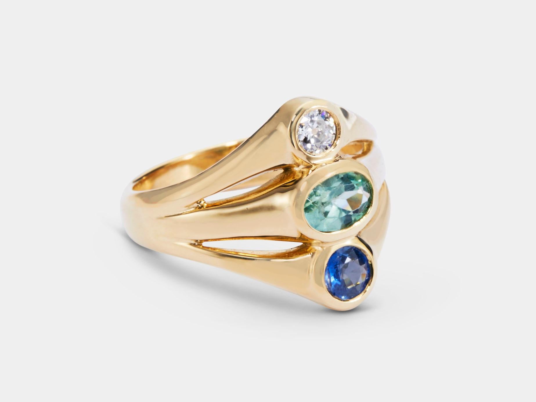 Petite Unmoored Ring from modern fine jewelry house, Baker & Black. While this jewel may be the Platonic ideal of a chunky pinky ring, it's more than suitable for the rest of your digits. 

• minty tourmaline
• blue sapphire
• old European cut