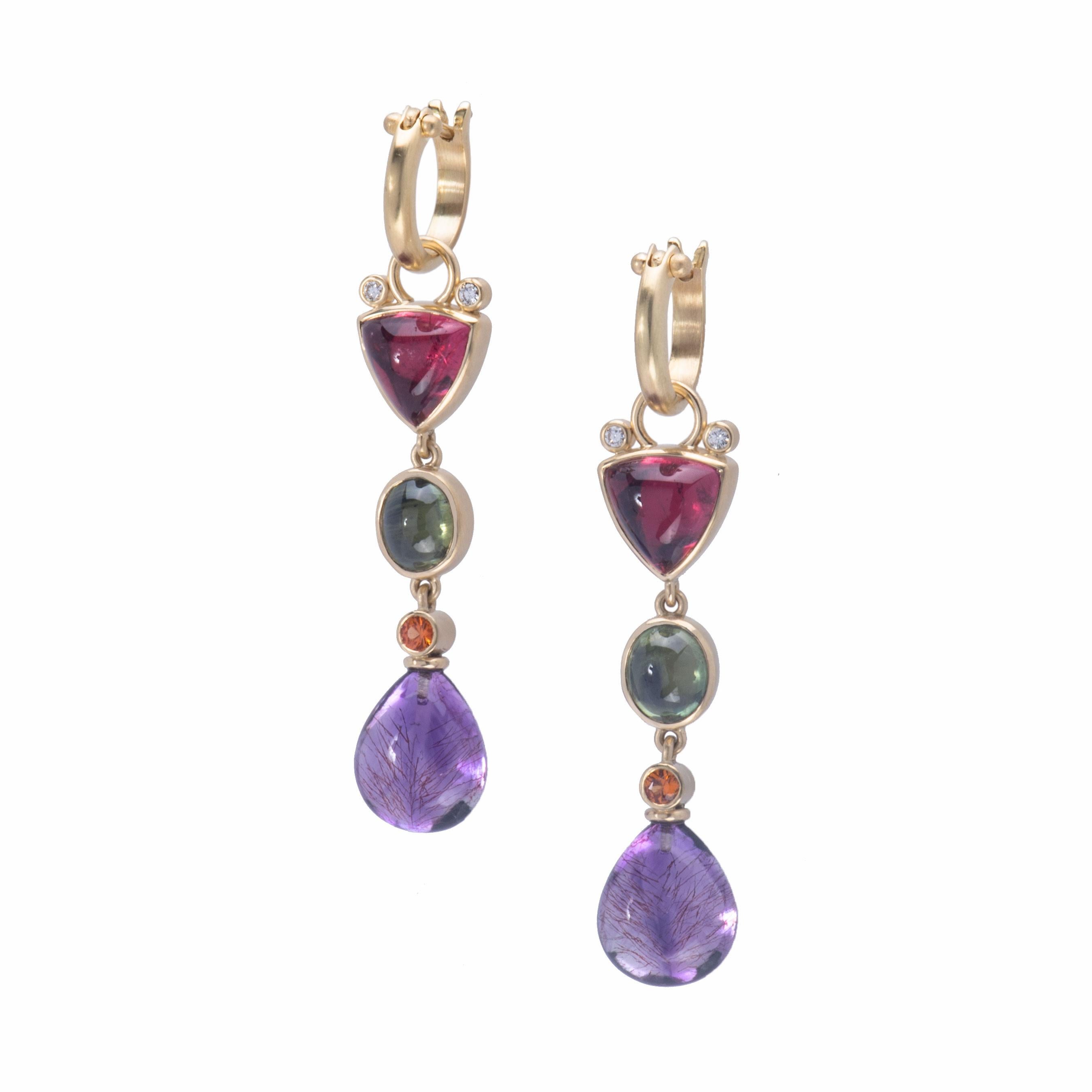 Rubellite tourmaline 6.23tcw cabochons top these earrings and are accented with pair of white diamonds. Kiwi-colored 3.41tcw green sapphires are centered and deep 14.95tcw amethyst briolettes are topped with mango colored sapphires. These earrings