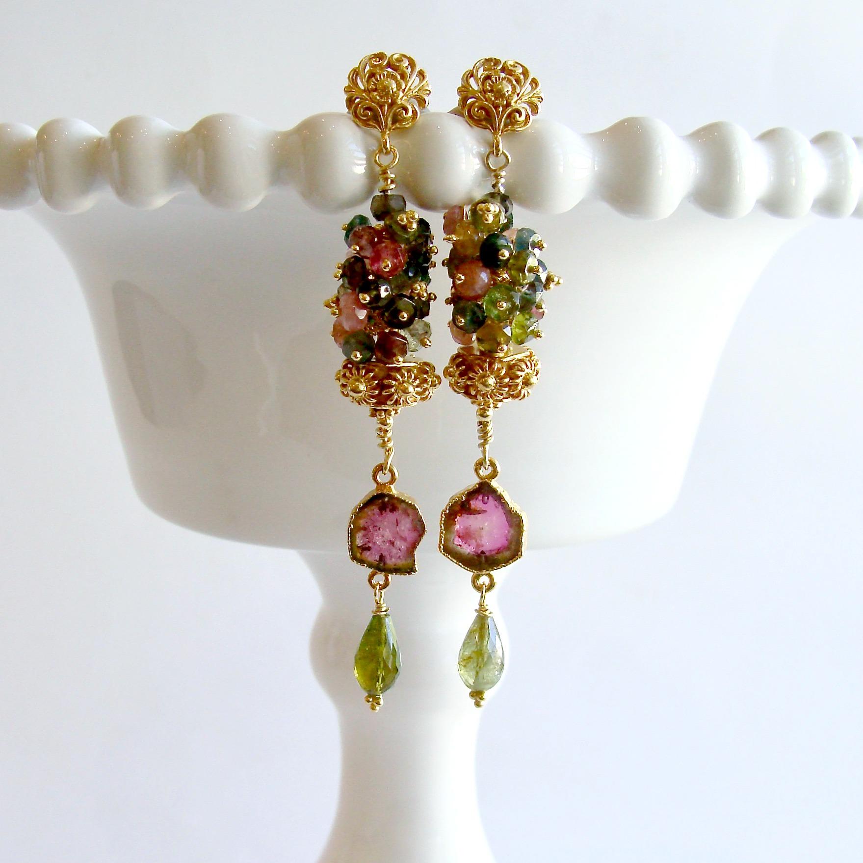 A generous cluster of multi-colored tourmaline rondelles crowns a hexagonal gold vermeil cannetille bead, while coveted watermelon tourmaline slices  and green tourmaline teardrops dangle sweetly below.  The design is suspended from gorgeous gold