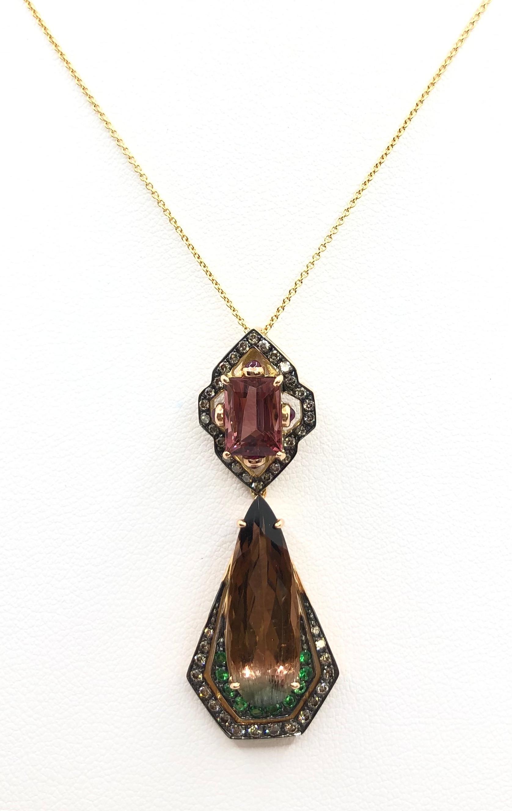 Tourmaline 7.86 carats with Ruby 0.12 carat, Tsavorite 0.15 carat and Brown Diamond 0.42 carat Pendant set in 18 Karat Gold Settings
(chain not included)

Width: 1.7 cm 
Length: 4.4 cm
Total Weight: 6.94 grams

