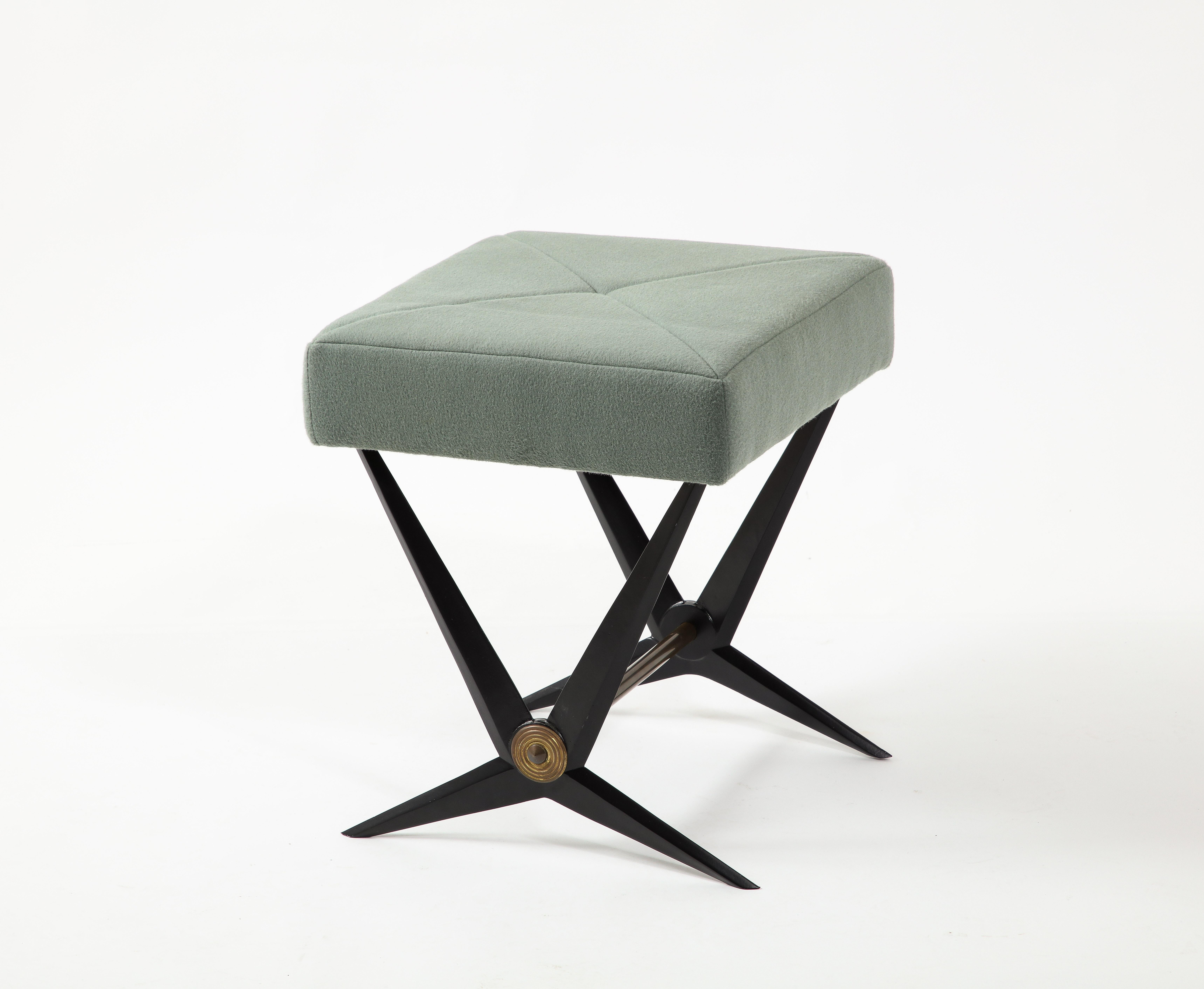 Enameled cast Aluminum and Brass stools with teal wool upholstery.
