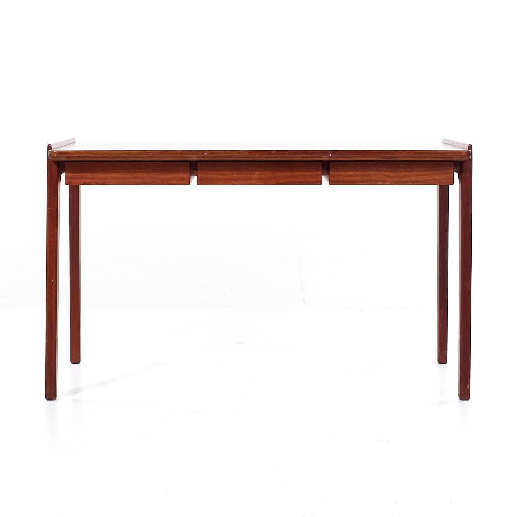 Tove and Edvard Kindt Larsen for Thorald Madsens Mid Century Danish Teak Desk

This desk measures: 47.5 wide x 29 deep x 28.75 high, with a chair clearance of 24 inches

All pieces of furniture can be had in what we call restored vintage condition.