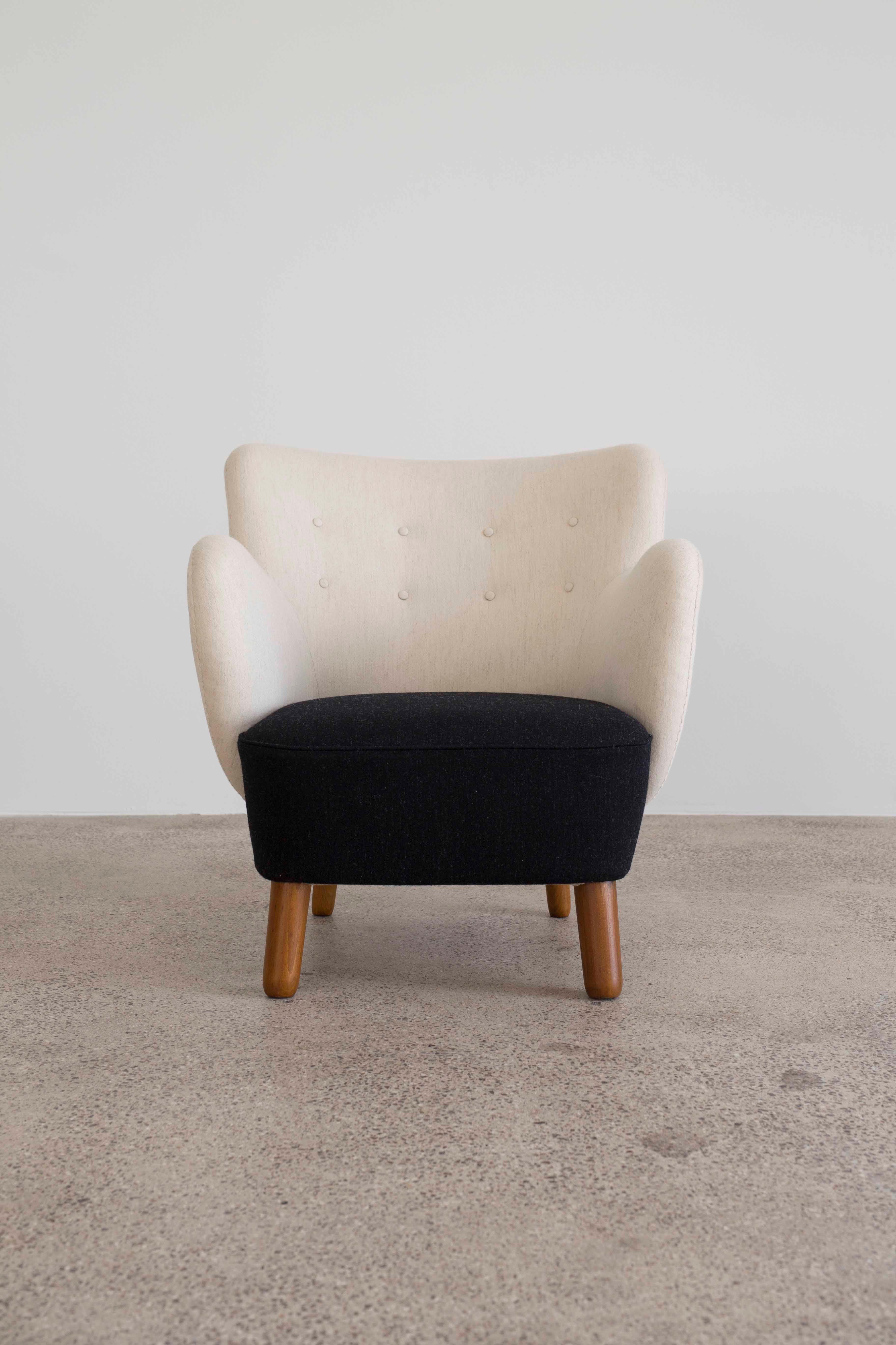 Rare Tove & Edvard Kindt Larsen easy chair, designed 1938 and executed by cabinetmaker Gustav Bertelsen. Legs of stained wood, upholstered in two-tone fabric designed by Tove Kindt-Larsen. 

Measures: H 86 x W 73 x D 86. 

 