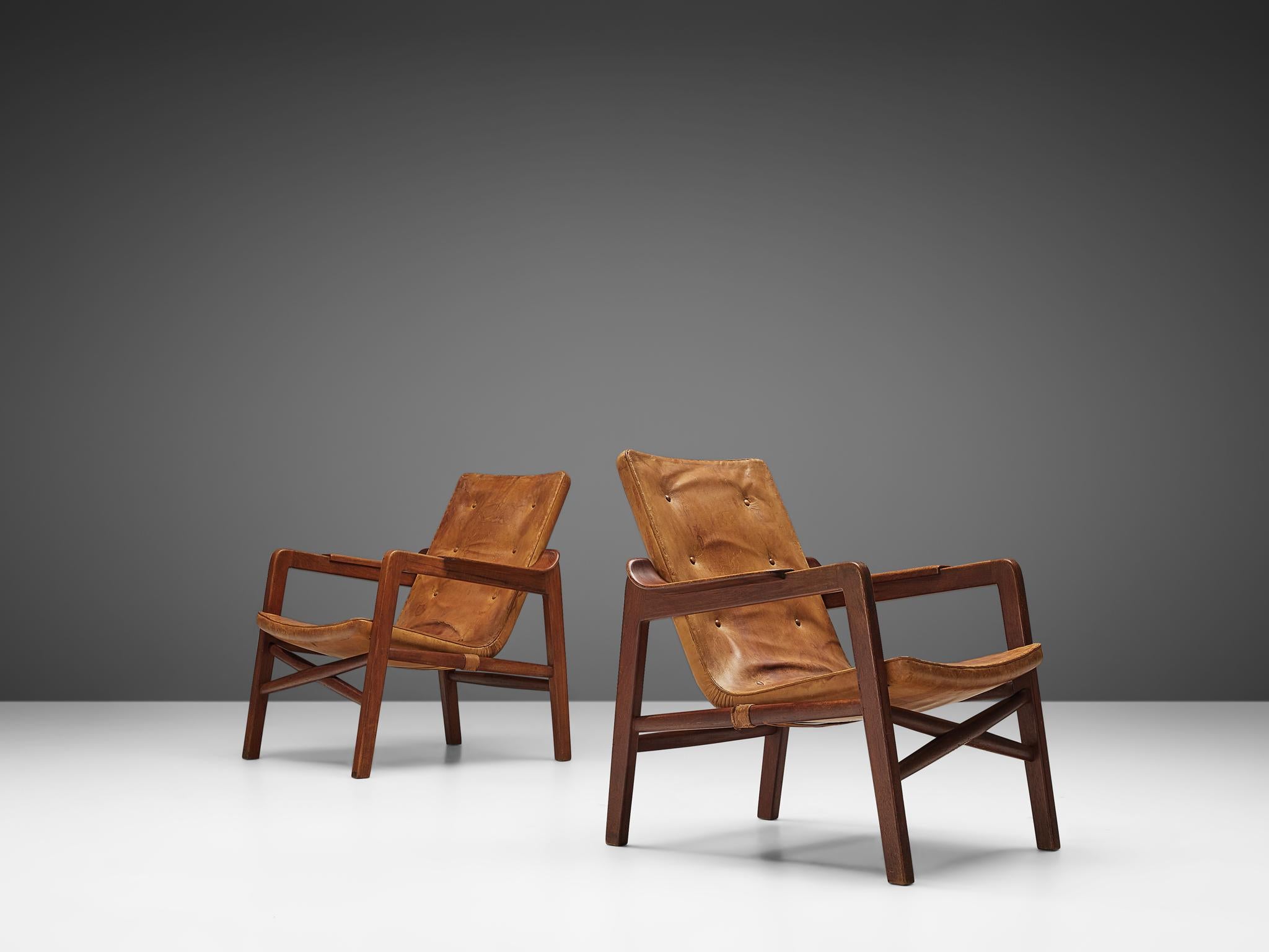 Tove & Edvard Kindt-Larsen for Gustav Bertelsen, pair of 'Fireplace' chairs, teak, leather, Denmark, 1940

This pair of lounge chairs was specially designed to sit in front of a fireplace. When it was first exhibited, this model was mentioned as a